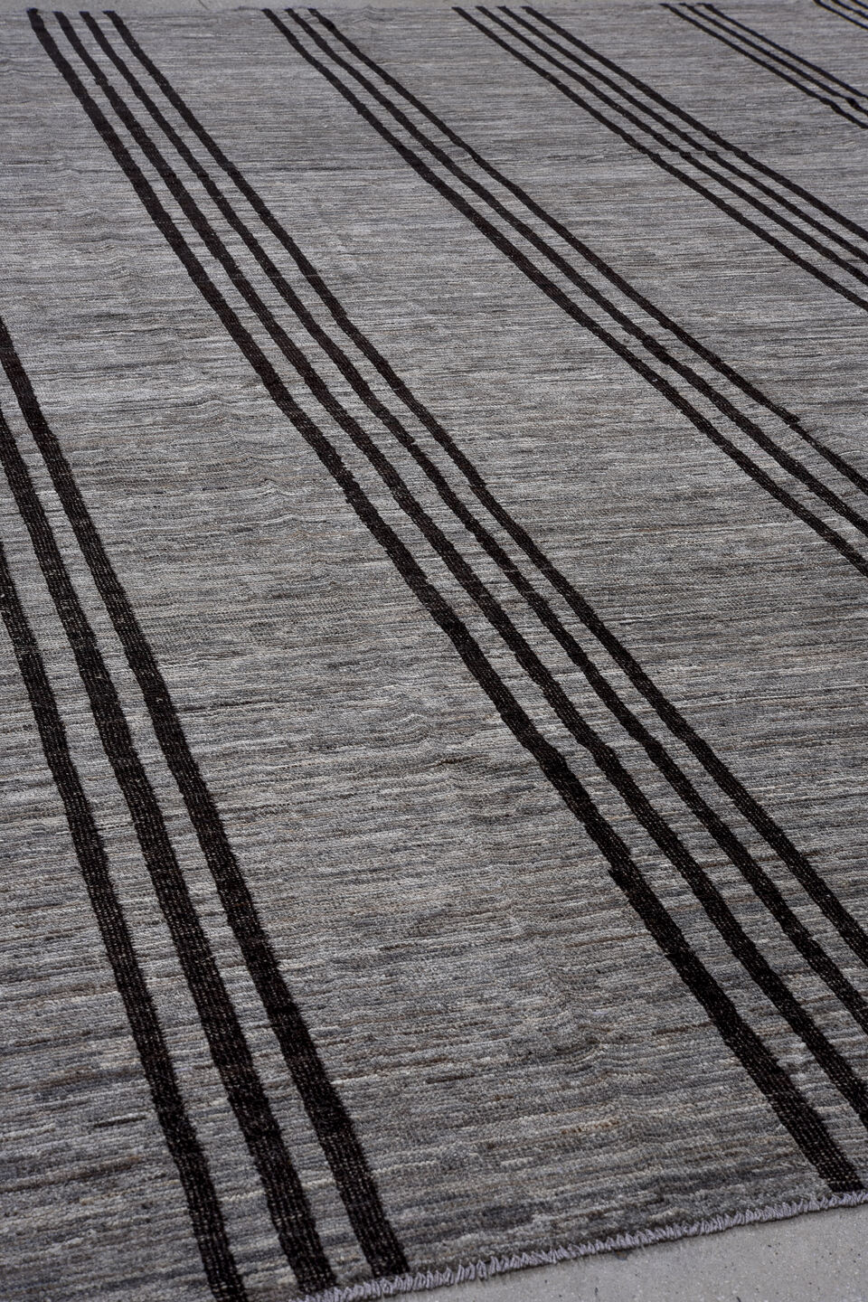 12' x 14' one-of-a-kind handmade vintage Tulu oversize rug. Color palette: gray, charcoal, black, ivory