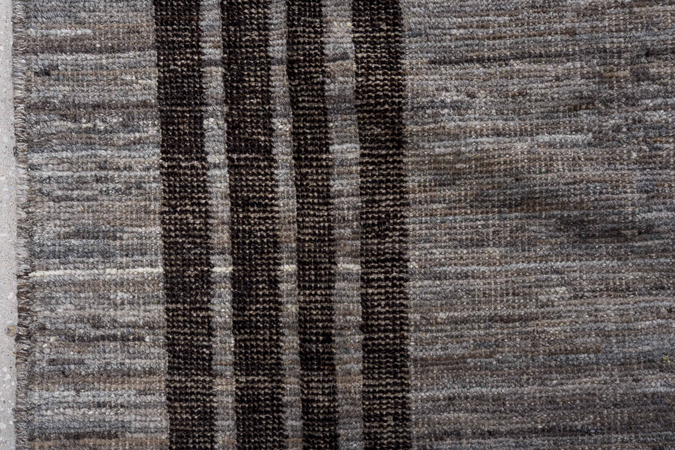 12' x 14' one-of-a-kind handmade vintage Tulu oversize rug. Color palette: gray, charcoal, black, ivory