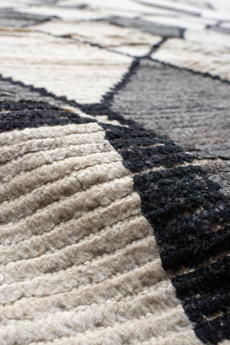 13' x 17' one-of-a-kind handmade vintage Tulu oversize rug. Color palette: ivory, charcoal, gray, black