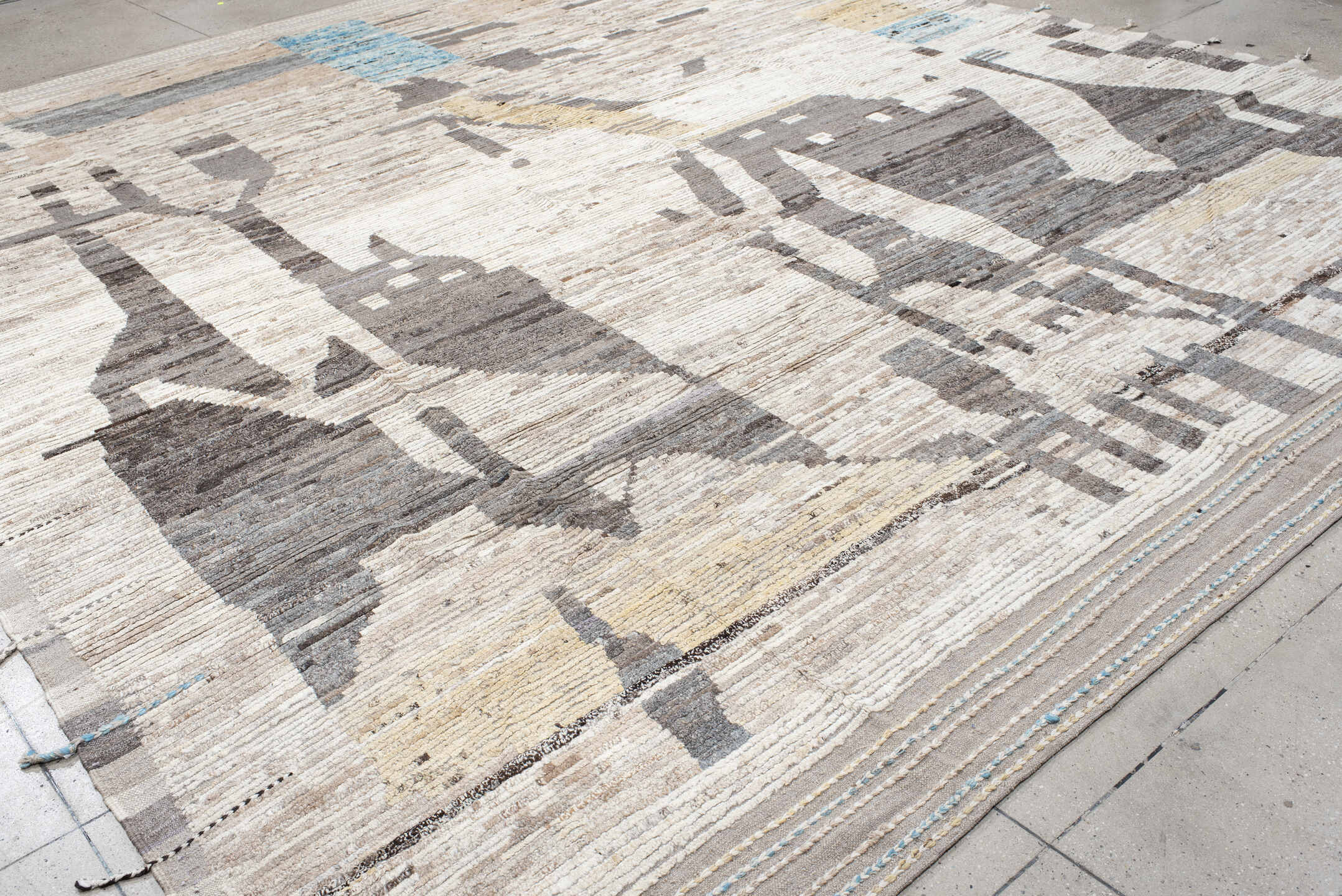 13' x 15' one-of-a-kind handmade vintage Tulu oversize rug. Color palette: ivory, taupe, charcoal, sky_blue, pale_gold, gray