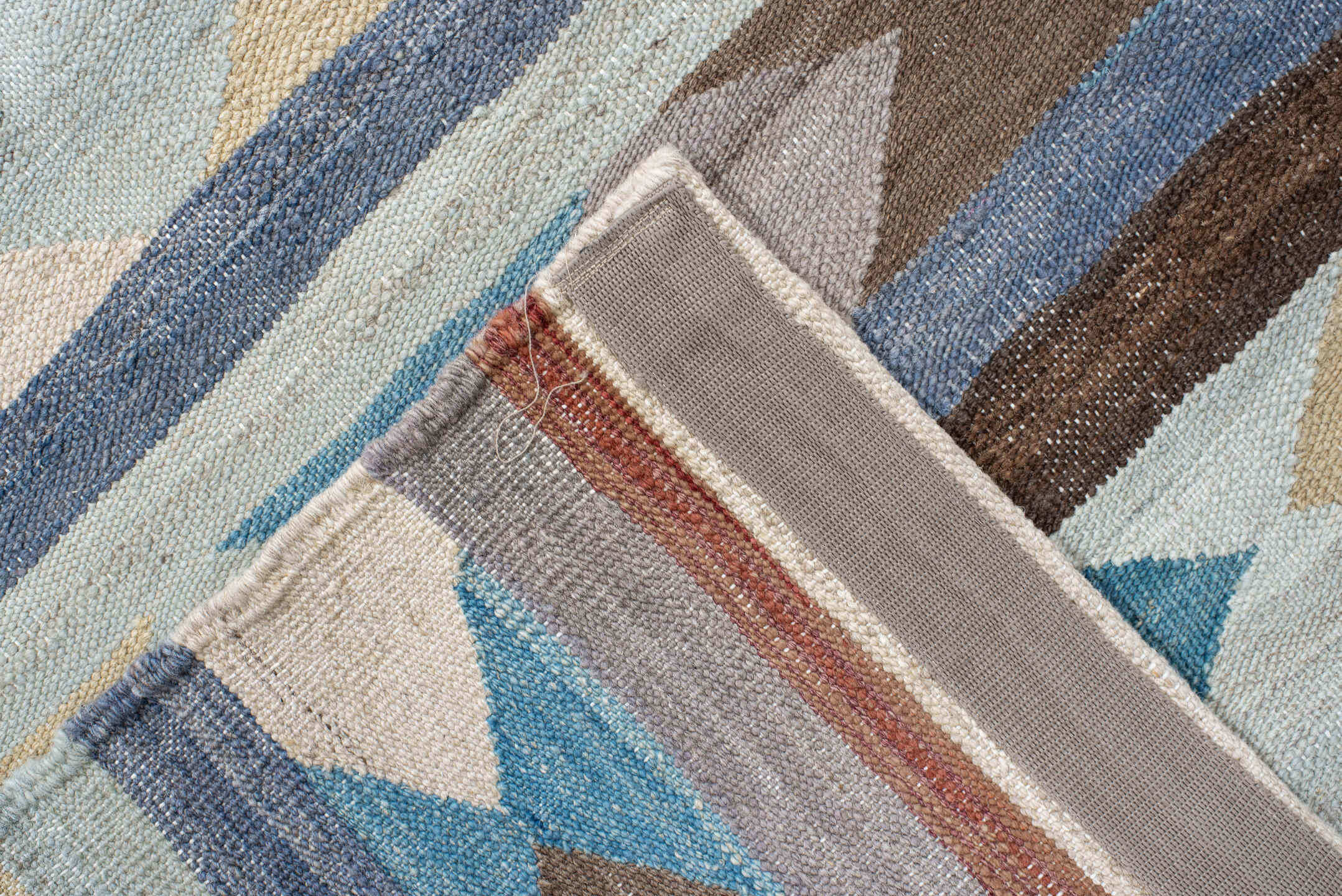 2' x 9' one-of-a-kind handmade vintage Kilim runner rug. Color palette: gray, brown, red, light blue, light gray, pink