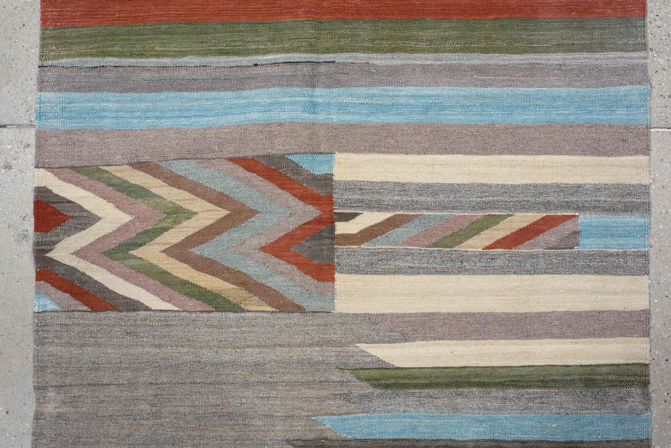 3' x 9' one-of-a-kind handmade vintage Kilim runner rug. Color palette: gray, ivory, rust, pale blue, olive, taupe, charcoal