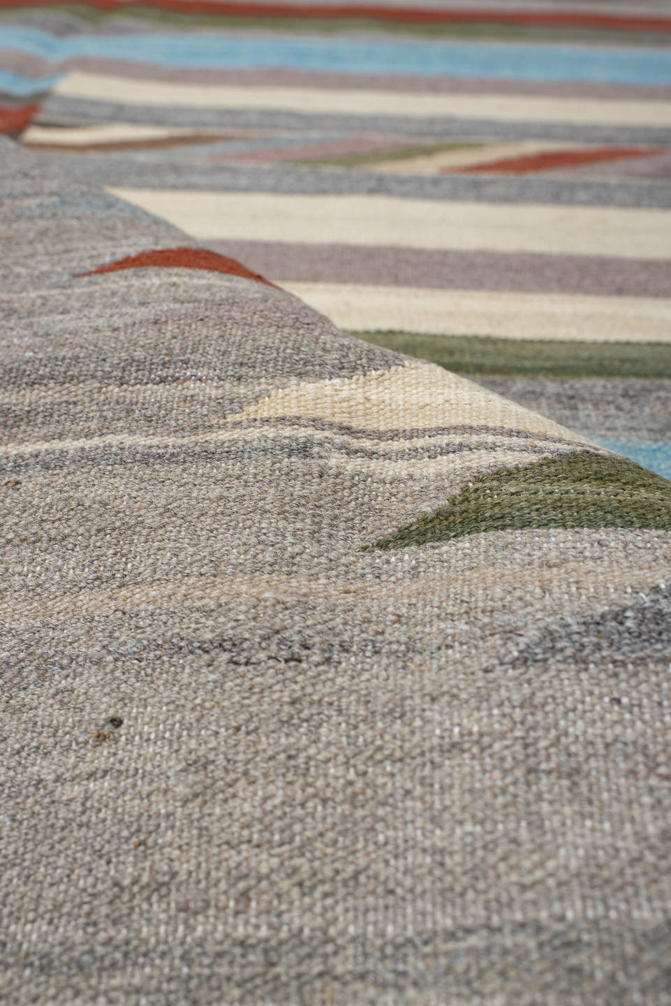 3' x 9' one-of-a-kind handmade vintage Kilim runner rug. Color palette: gray, ivory, rust, pale blue, olive, taupe, charcoal