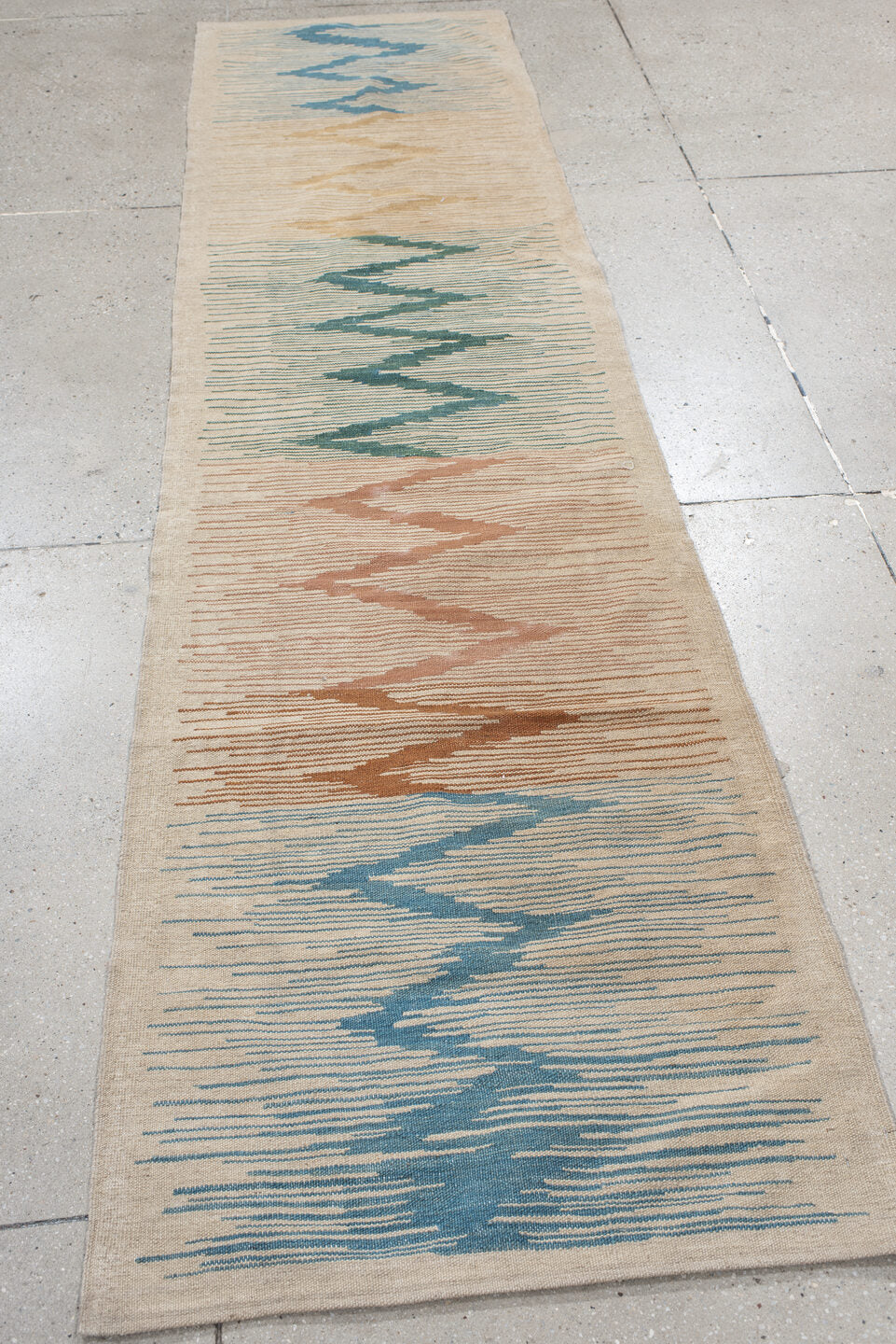 2' x 9' one-of-a-kind handmade vintage Kilim runner rug. Color palette: ivory, sky blue, teal, blush, terra cotta, sand