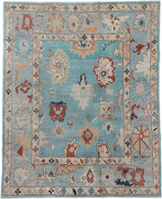 7' x 9' one-of-a-kind handmade vintage Oushak rug. Color palette: sky blue, ivory, pale blue, terra cotta, navy, beige