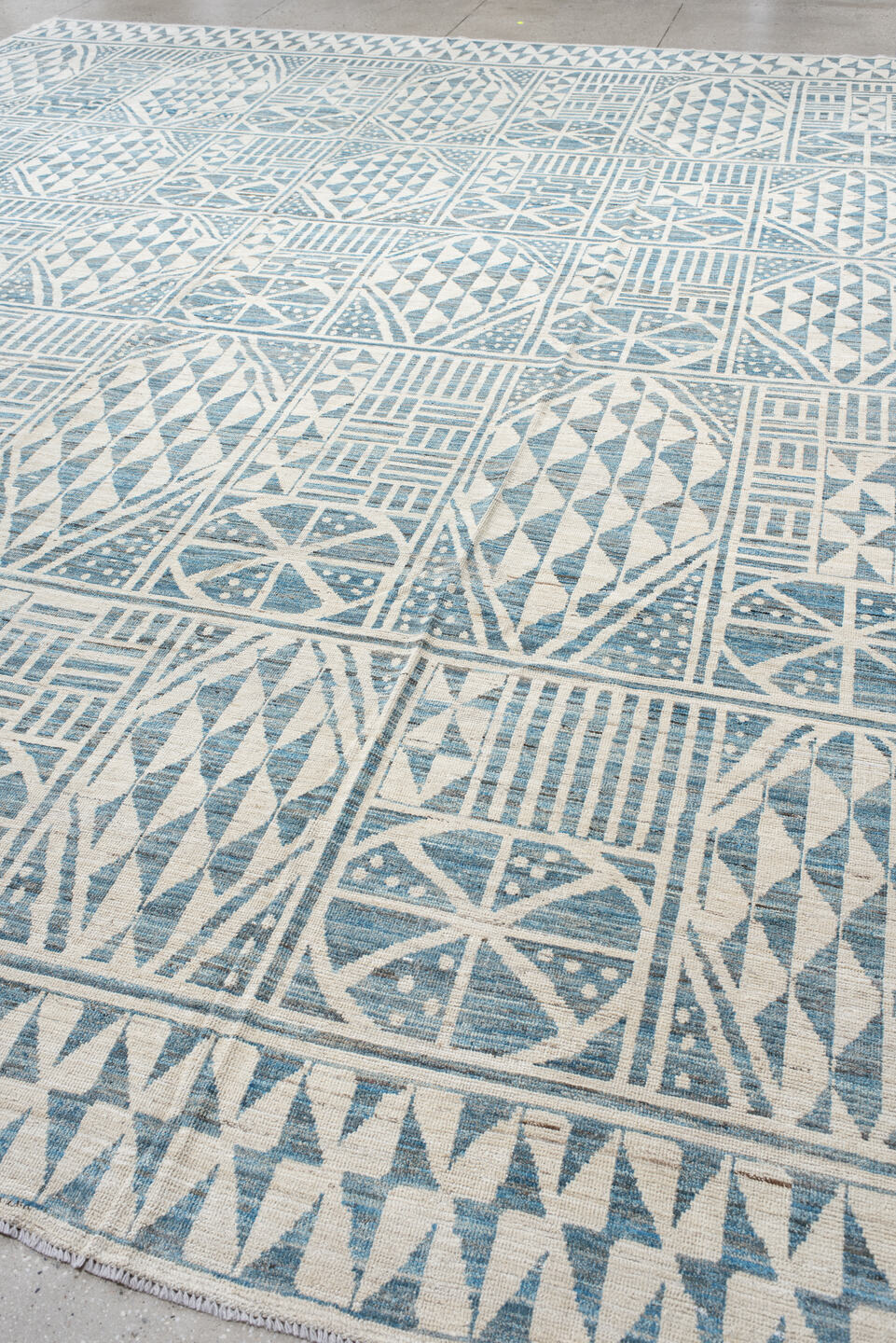 13' x 17' one-of-a-kind handmade vintage Tulu oversize rug. Color palette: ivory, sky blue, pale blue, light blue