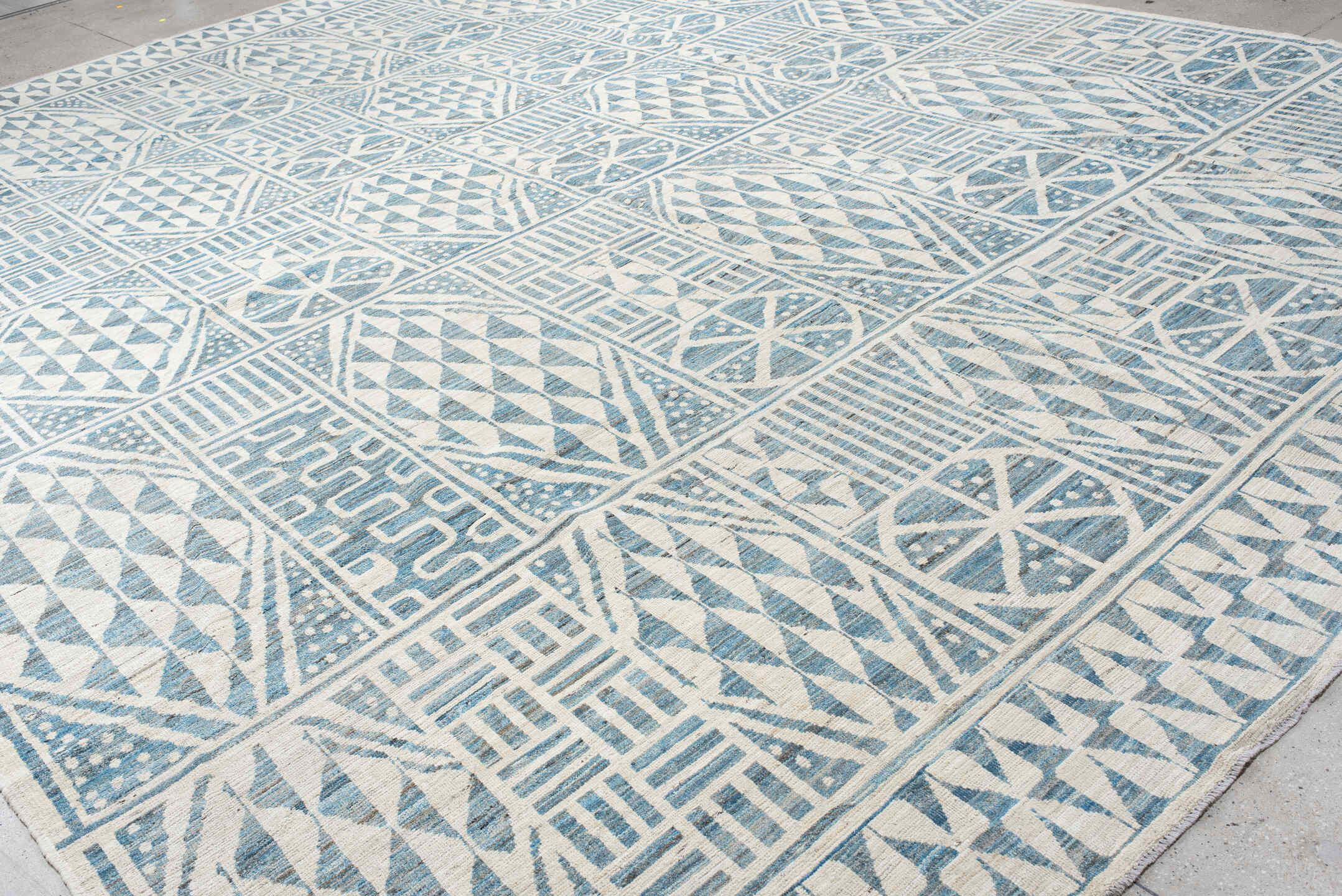 13' x 17' one-of-a-kind handmade vintage Tulu oversize rug. Color palette: ivory, sky blue, pale blue, light blue