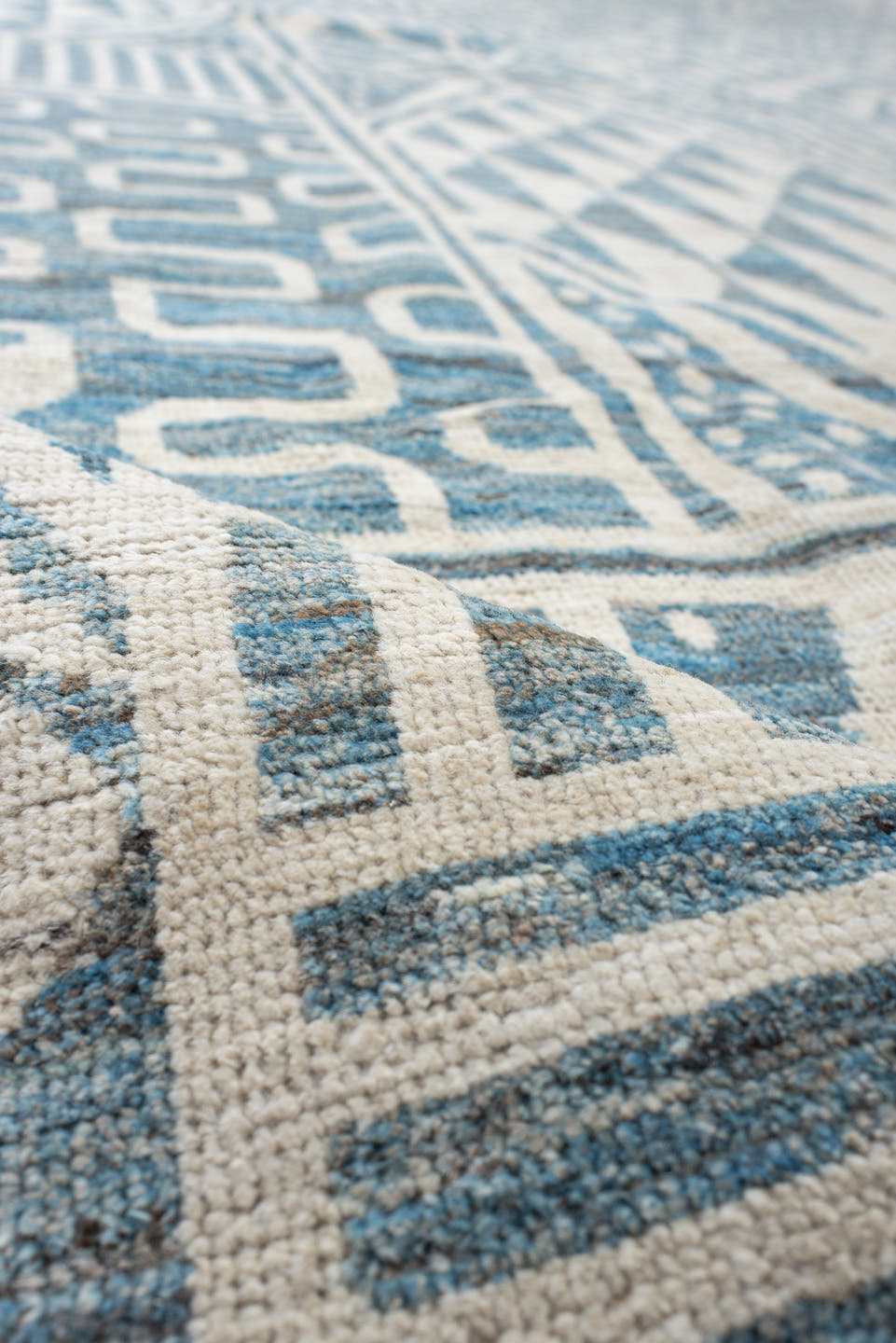 13' x 17' one-of-a-kind handmade vintage Tulu oversize rug. Color palette: ivory, sky blue, pale blue, light blue
