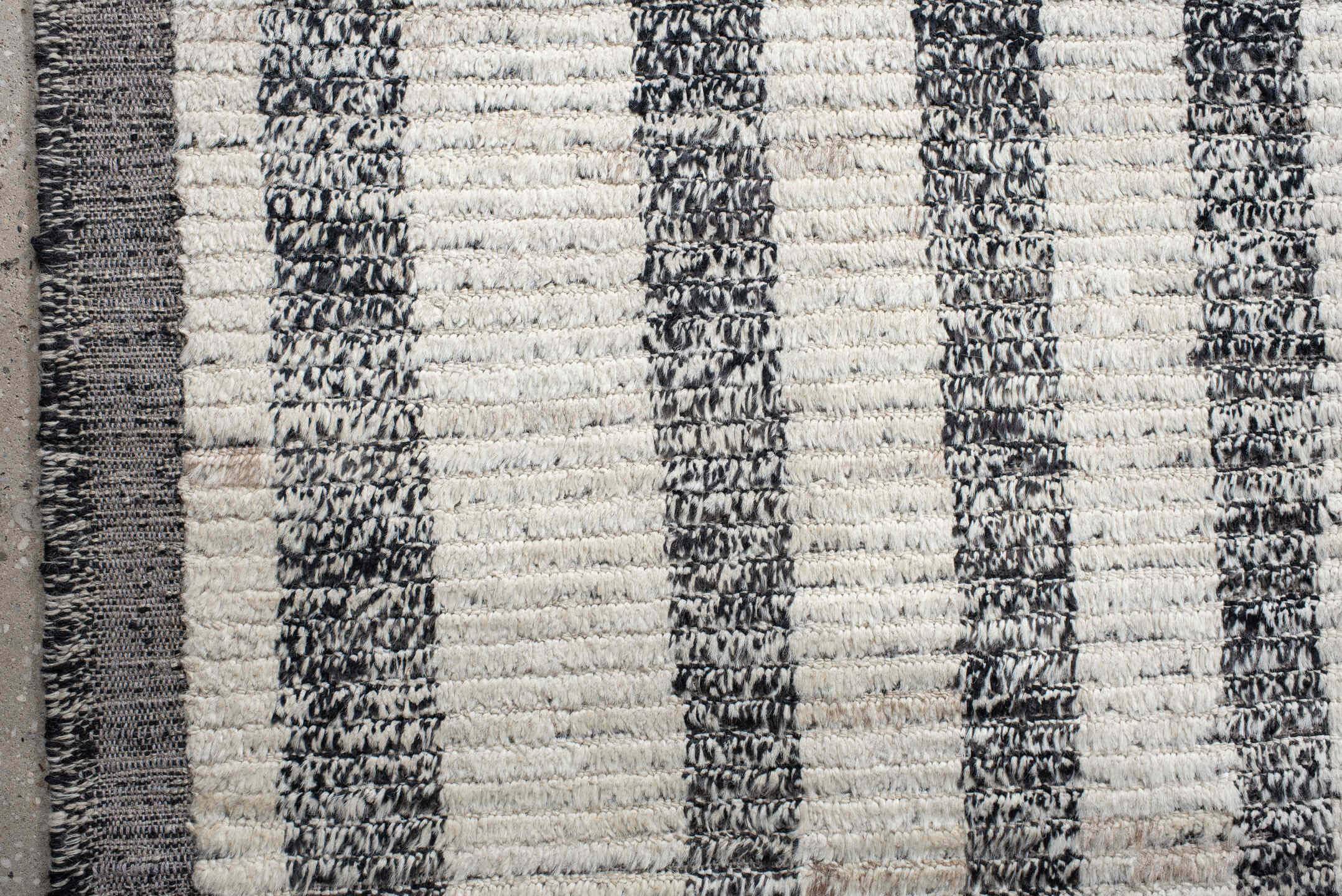 14' x 19' one-of-a-kind handmade vintage Tulu oversize rug. Color palette: ivory, charcoal, gray, black
