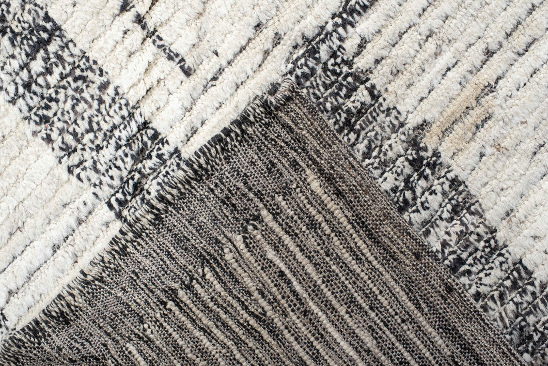 14' x 19' one-of-a-kind handmade vintage Tulu oversize rug. Color palette: ivory, charcoal, gray, black