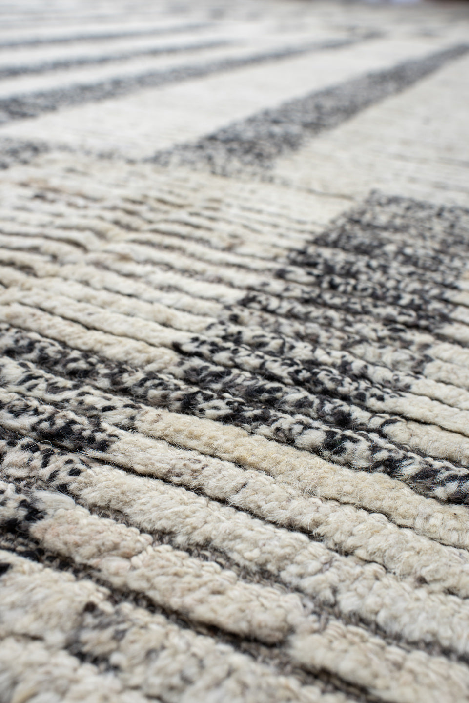 14' x 19' one-of-a-kind handmade vintage Tulu oversize rug. Color palette: ivory, charcoal, gray, black