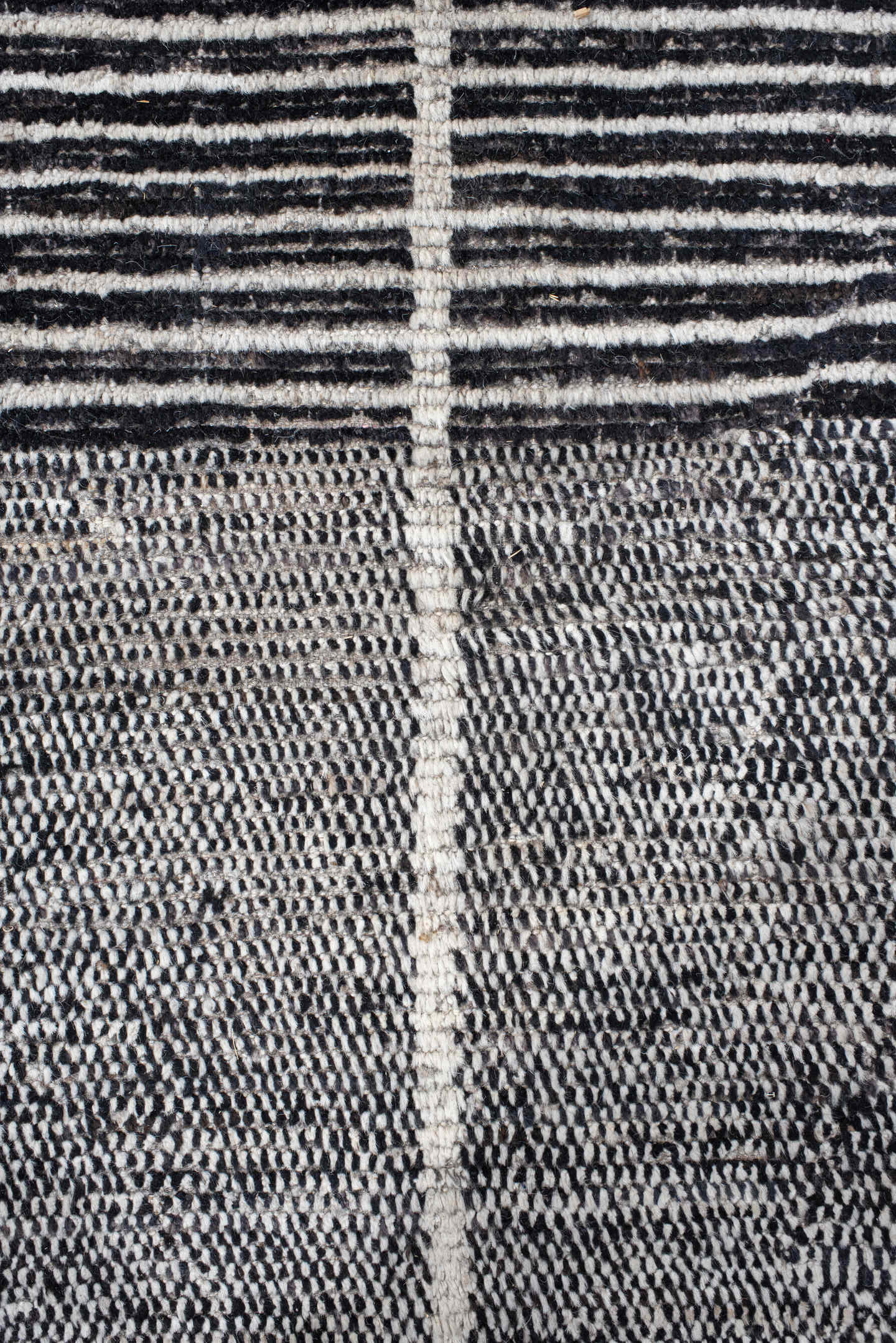 14' x 22' one-of-a-kind handmade vintage Tulu oversize rug. Color palette: charcoal, ivory, gray, black