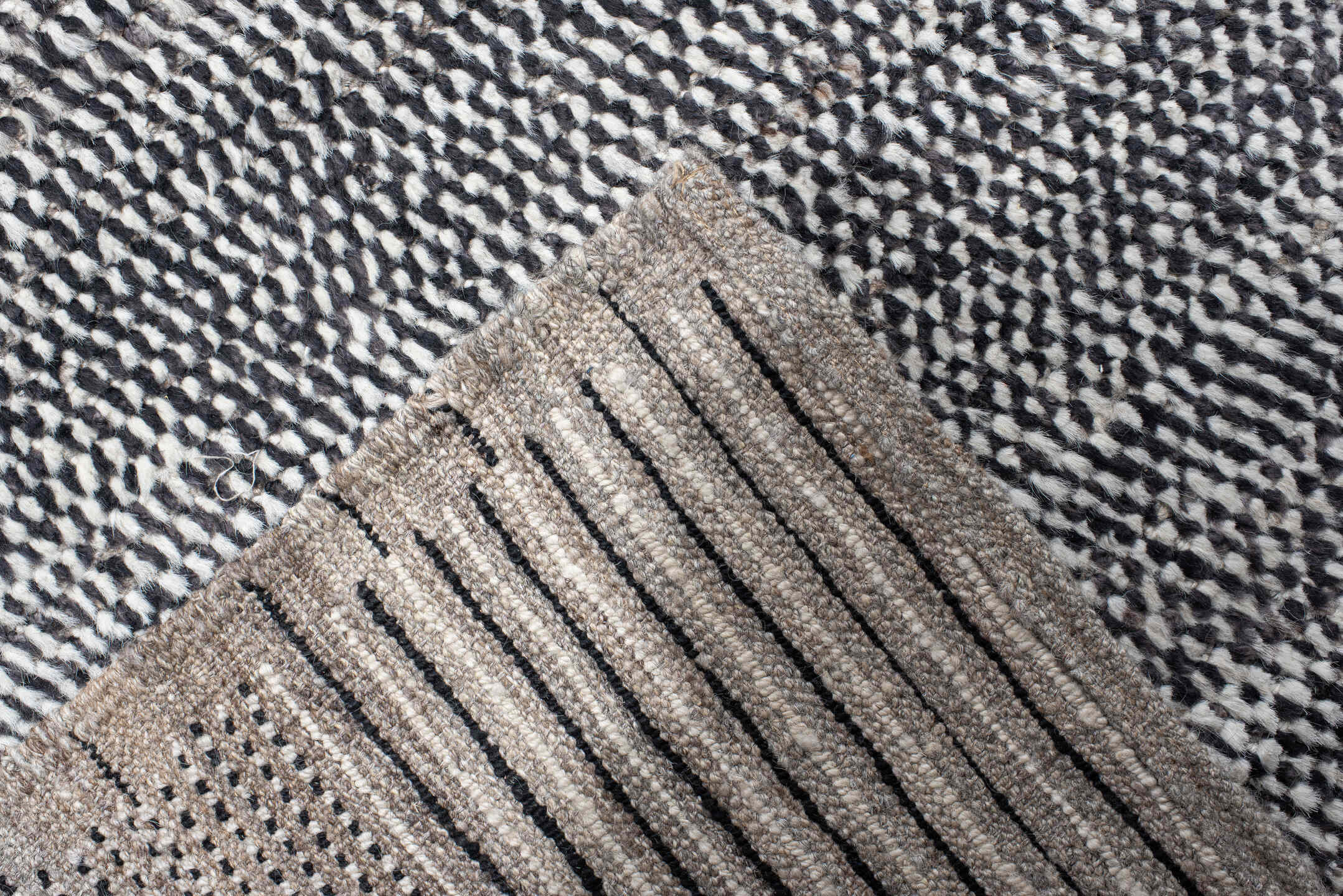 14' x 22' one-of-a-kind handmade vintage Tulu oversize rug. Color palette: charcoal, ivory, gray, black