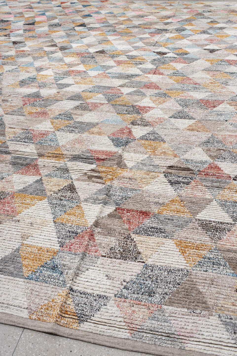 16' x 20' one-of-a-kind handmade vintage Tulu oversize rug. Color palette: ivory, gray, taupe, sky blue, gold, coral