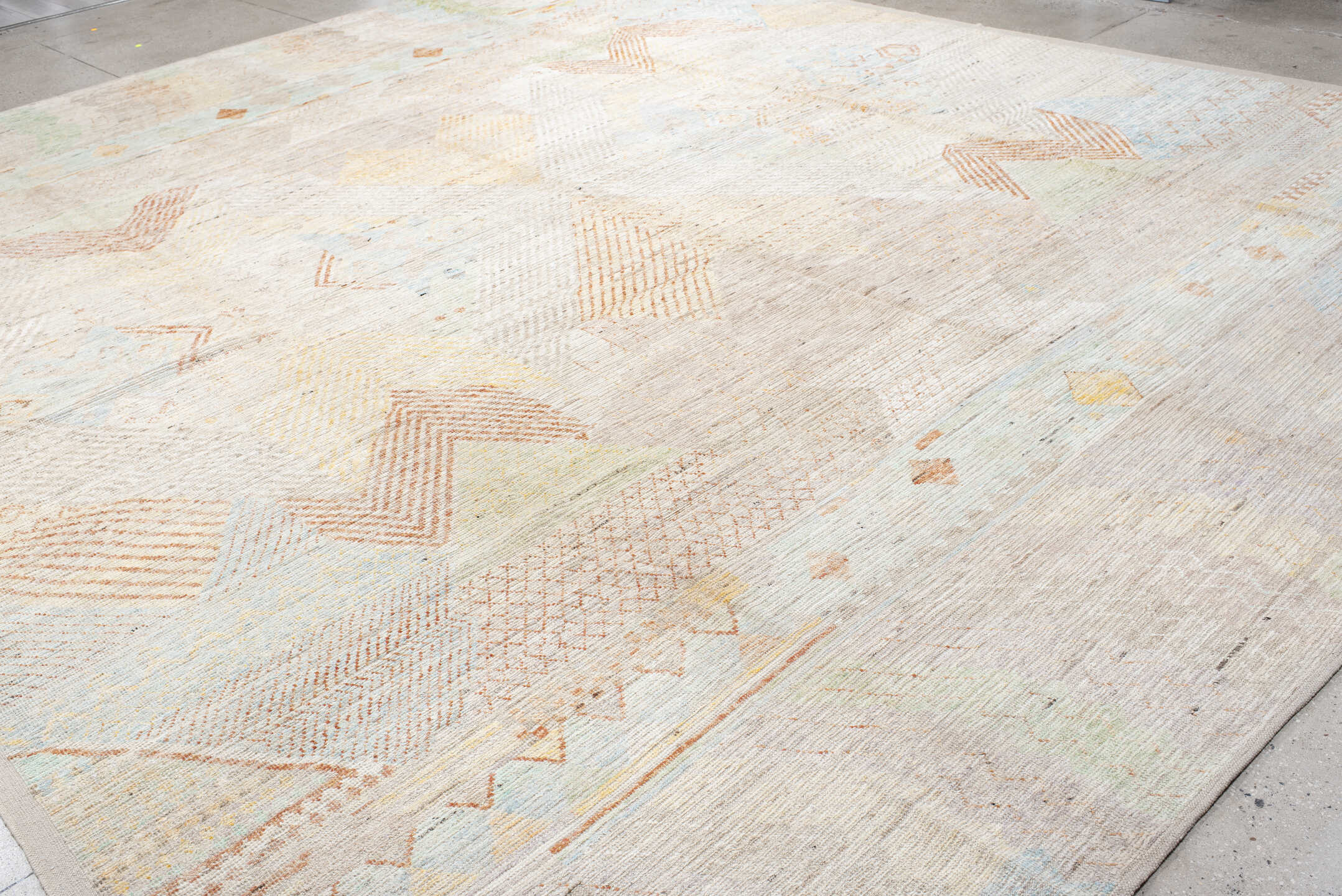 13' x 16' one-of-a-kind handmade vintage Tulu oversize rug. Color palette: ivory, peach, sky_blue, sage, soft_gold, taupe