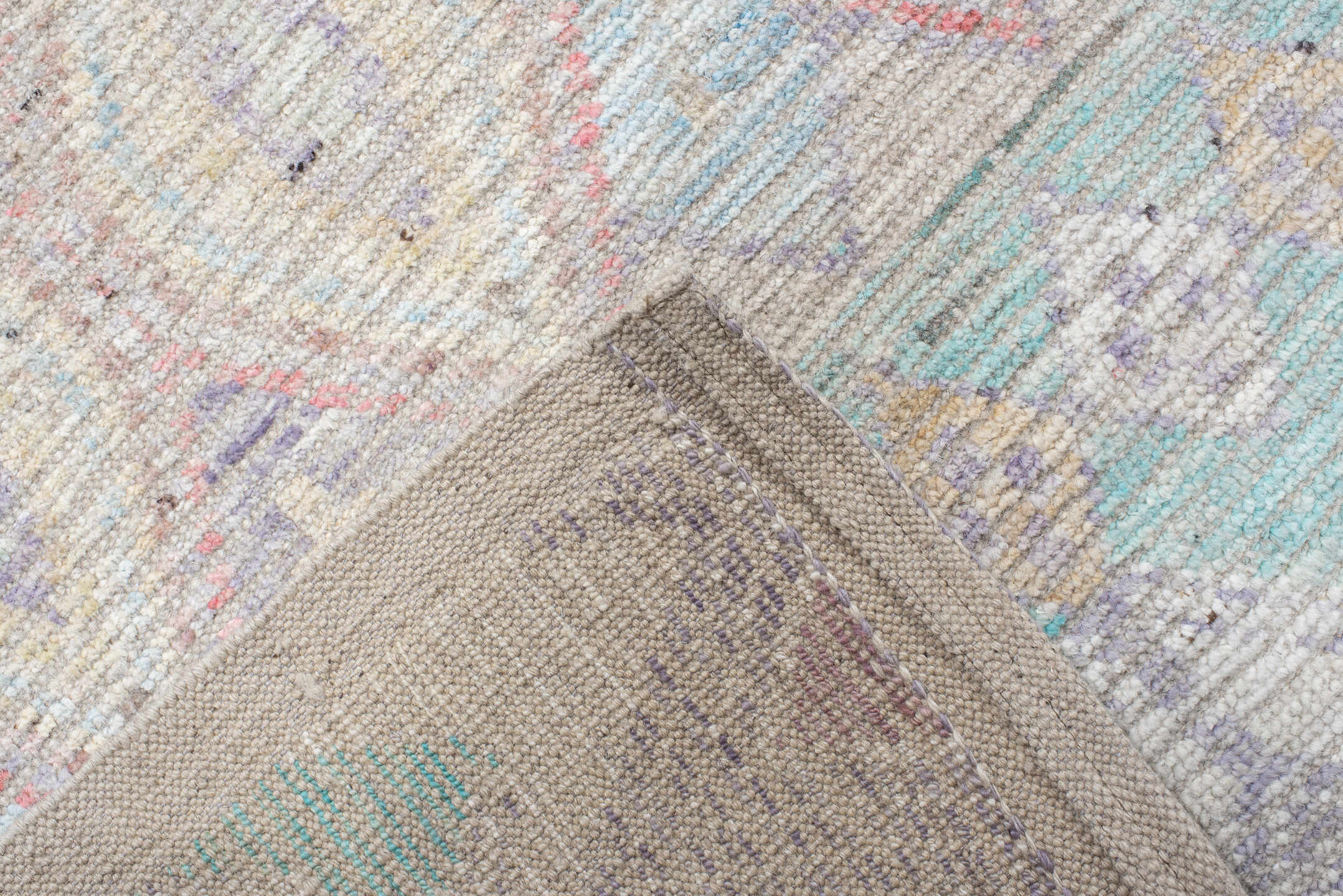 13' x 19' one-of-a-kind handmade vintage Tulu oversize rug. Color palette: ivory, lavender, aqua, blush, pale gold, taupe