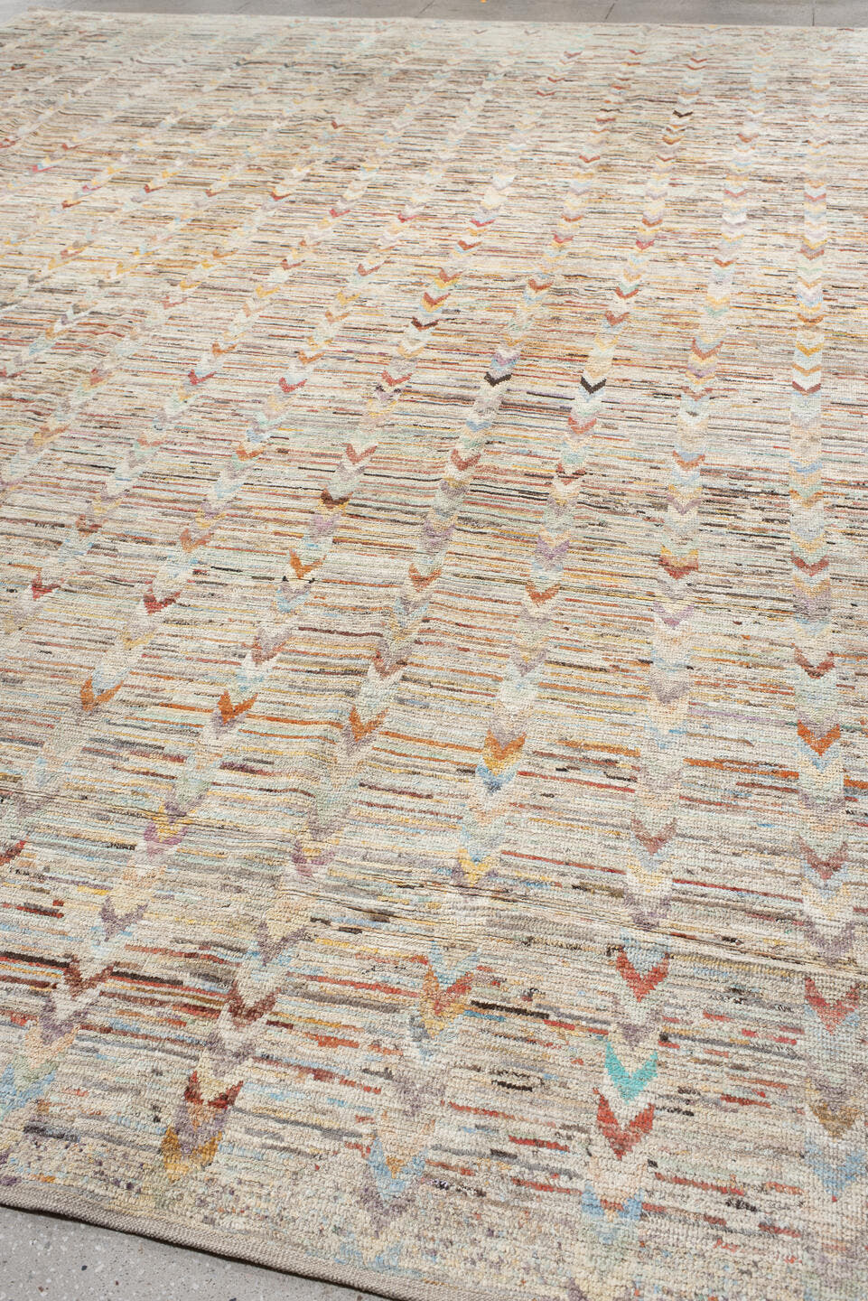 13' x 19' one-of-a-kind handmade vintage Tulu oversize rug. Color palette: ivory, cream, taupe, peach, sky_blue, charcoal