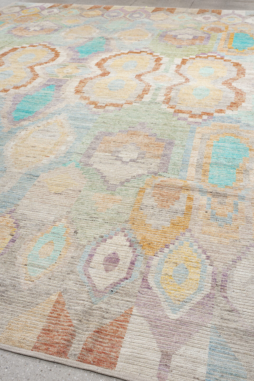 13' x 17' one-of-a-kind handmade vintage Tulu oversize rug. Color palette: ivory, aqua, lavender, pale_gold, coral, sage