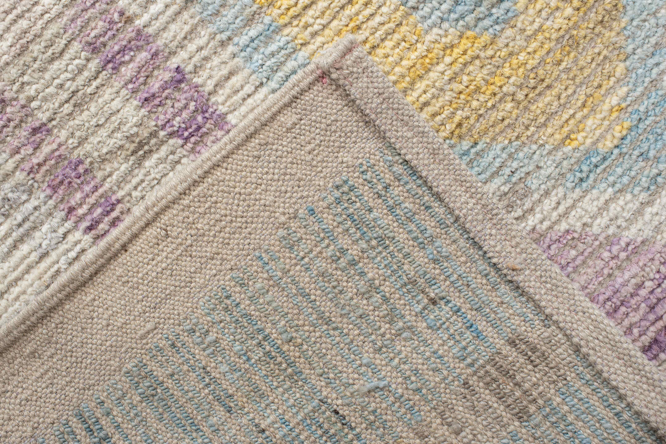 13' x 17' one-of-a-kind handmade vintage Tulu oversize rug. Color palette: ivory, aqua, lavender, pale_gold, coral, sage