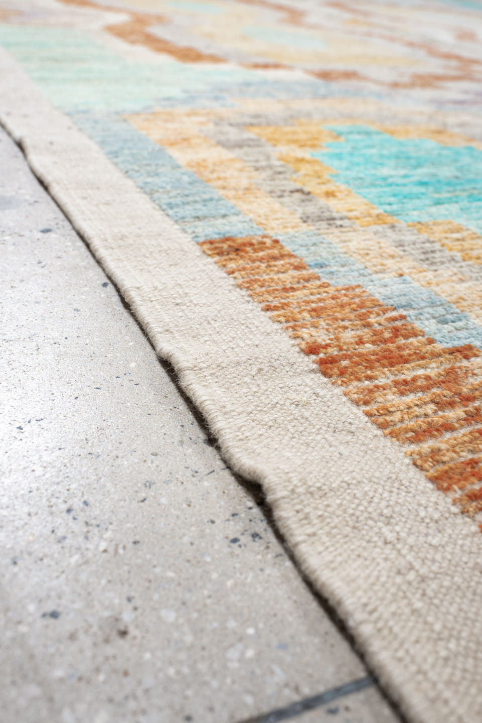 13' x 17' one-of-a-kind handmade vintage Tulu oversize rug. Color palette: ivory, aqua, lavender, pale_gold, coral, sage