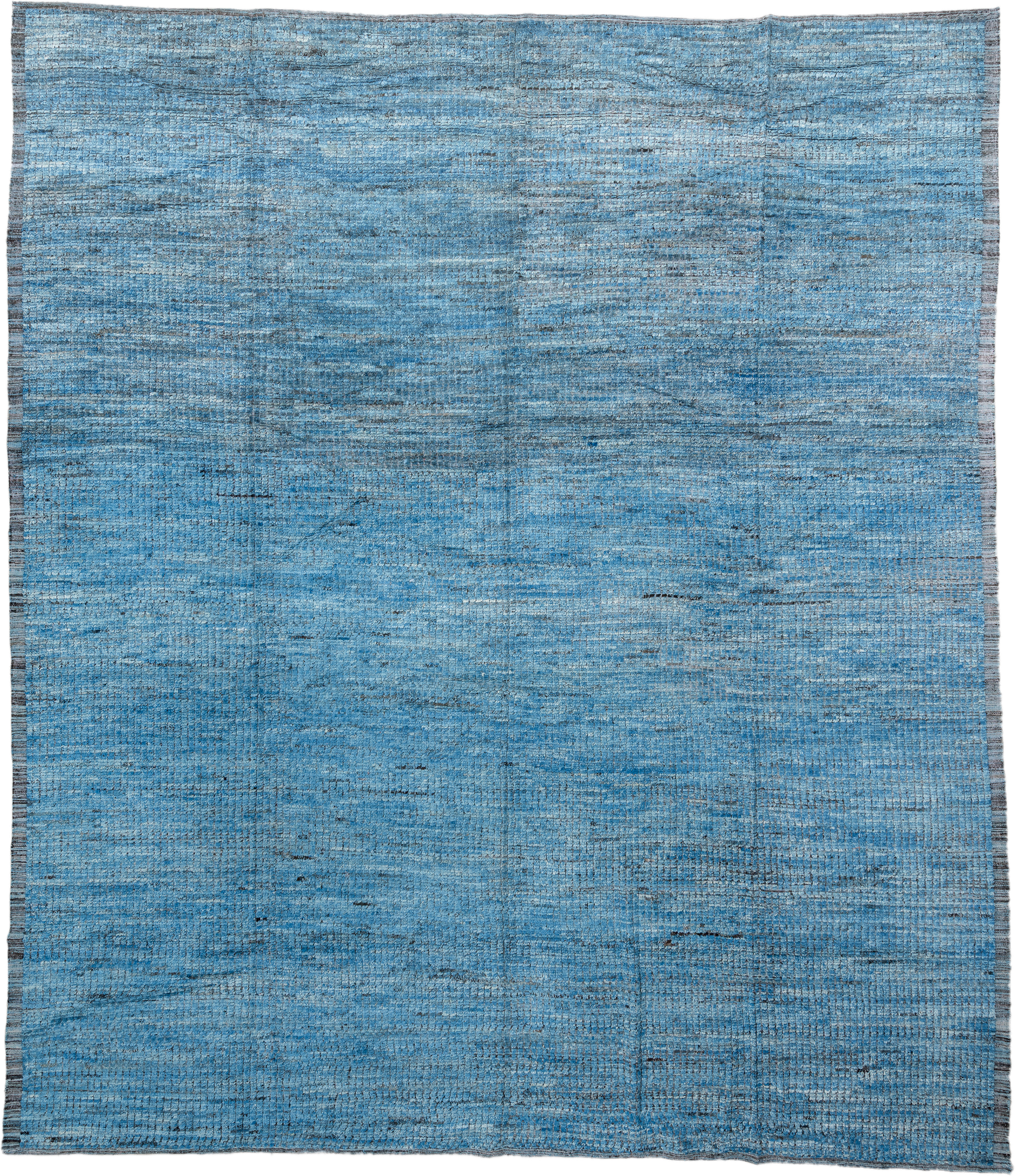 14' x 17' one-of-a-kind handmade vintage Tulu oversize rug. Color palette: sky blue, slate, charcoal, ivory, light blue