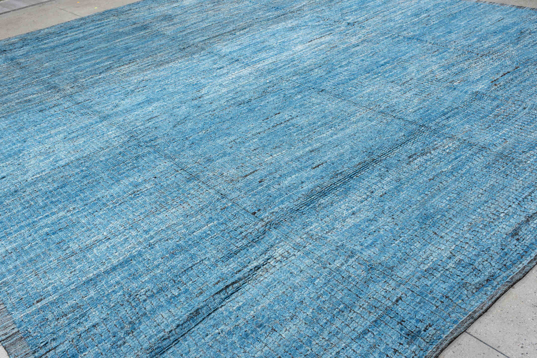 14' x 17' one-of-a-kind handmade vintage Tulu oversize rug. Color palette: sky blue, slate, charcoal, ivory, light blue