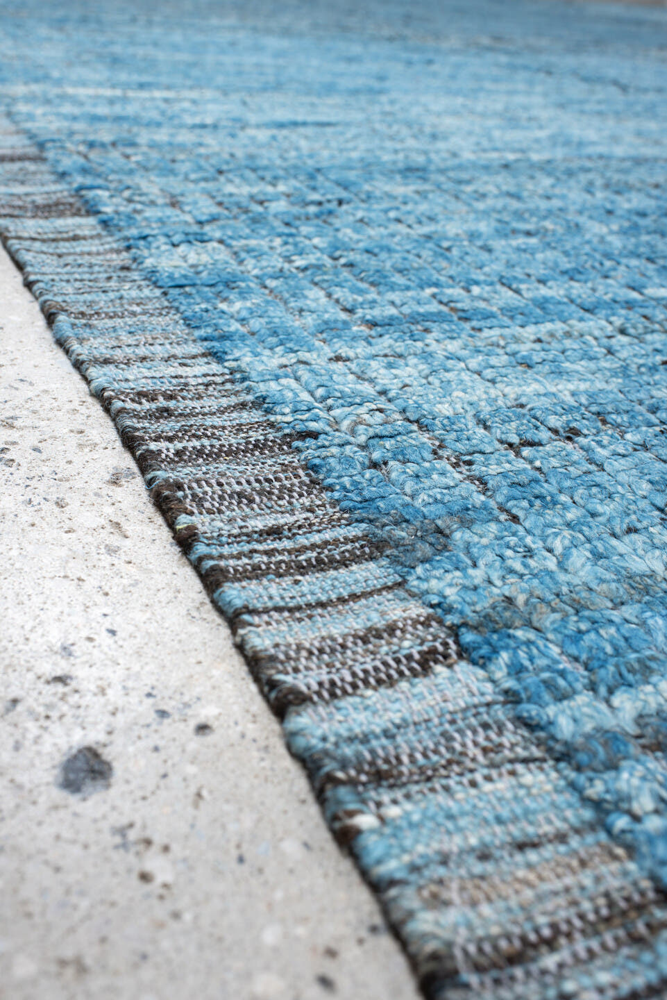 14' x 17' one-of-a-kind handmade vintage Tulu oversize rug. Color palette: sky blue, slate, charcoal, ivory, light blue
