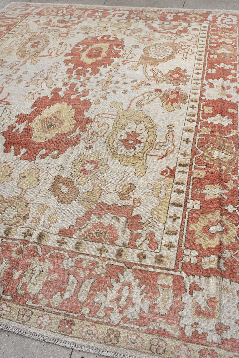 9' x 12' one-of-a-kind handmade vintage Oushak large size rug. Color palette: ivory, terra cotta, beige, sage, gold, taupe