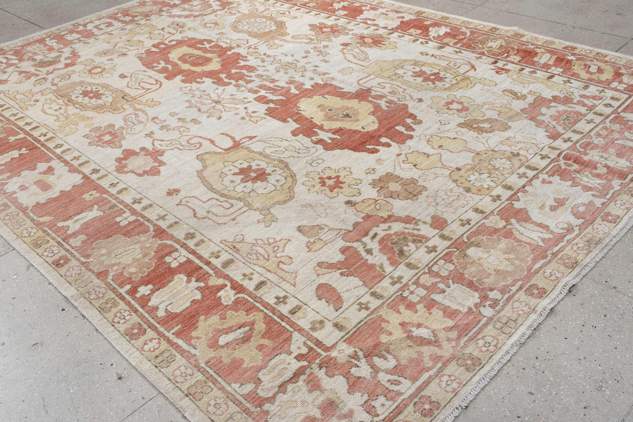 9' x 12' one-of-a-kind handmade vintage Oushak large size rug. Color palette: ivory, terra cotta, beige, sage, gold, taupe