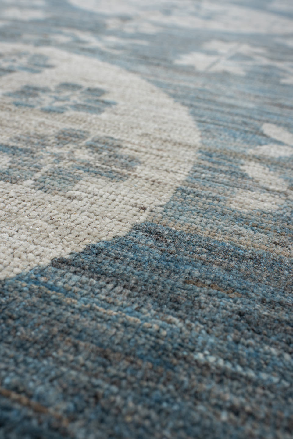 9' x 11' one-of-a-kind handmade vintage Khotan large size rug. Color palette: sky blue, ivory, slate, cream, light blue