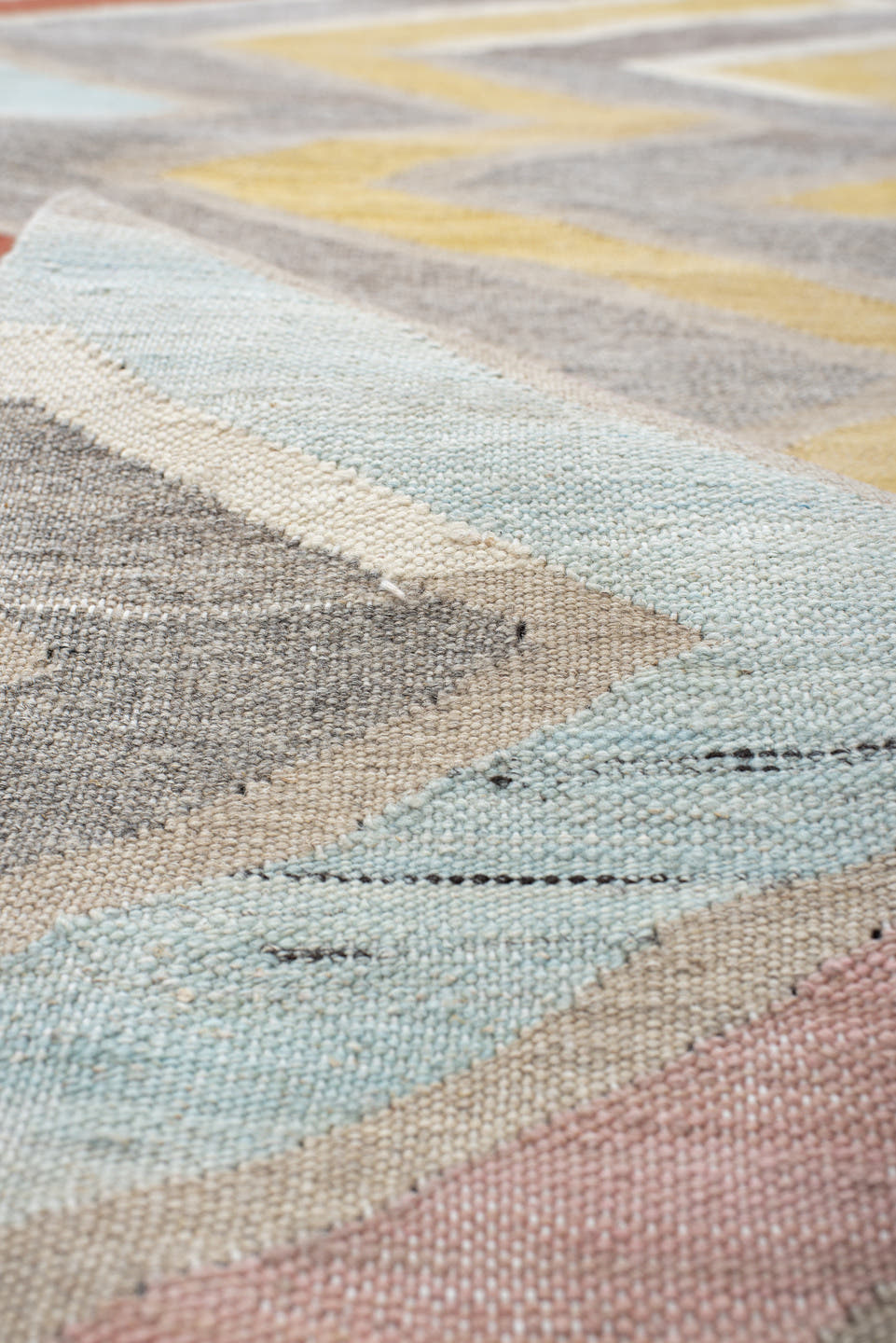2' x 9' one-of-a-kind handmade vintage Kilim runner rug. Color palette: ivory, gray, blush, pale blue, butter yellow, rust