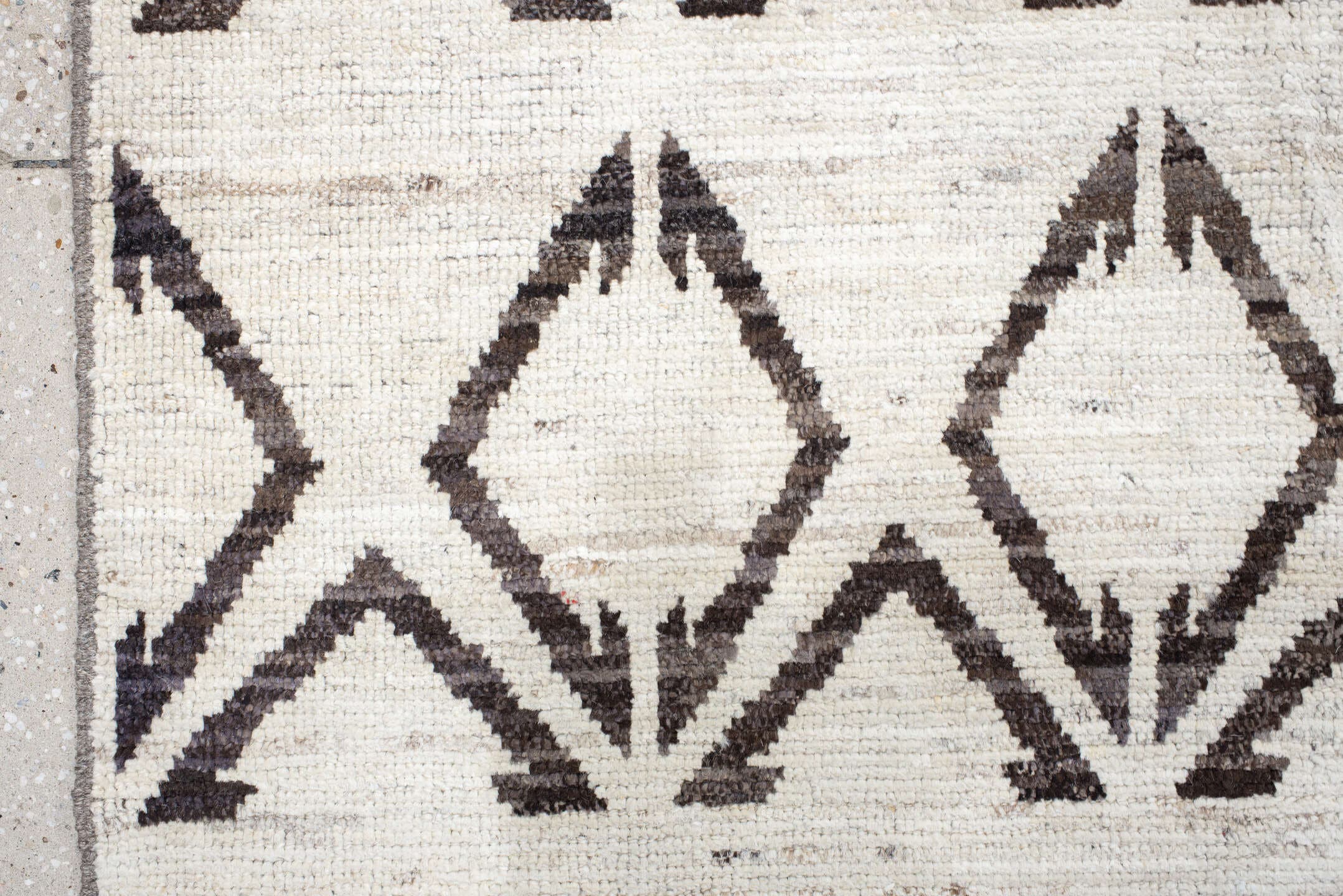 14' x 19' one-of-a-kind handmade vintage Tulu oversize rug. Color palette: ivory, charcoal, taupe, gray, black, beige