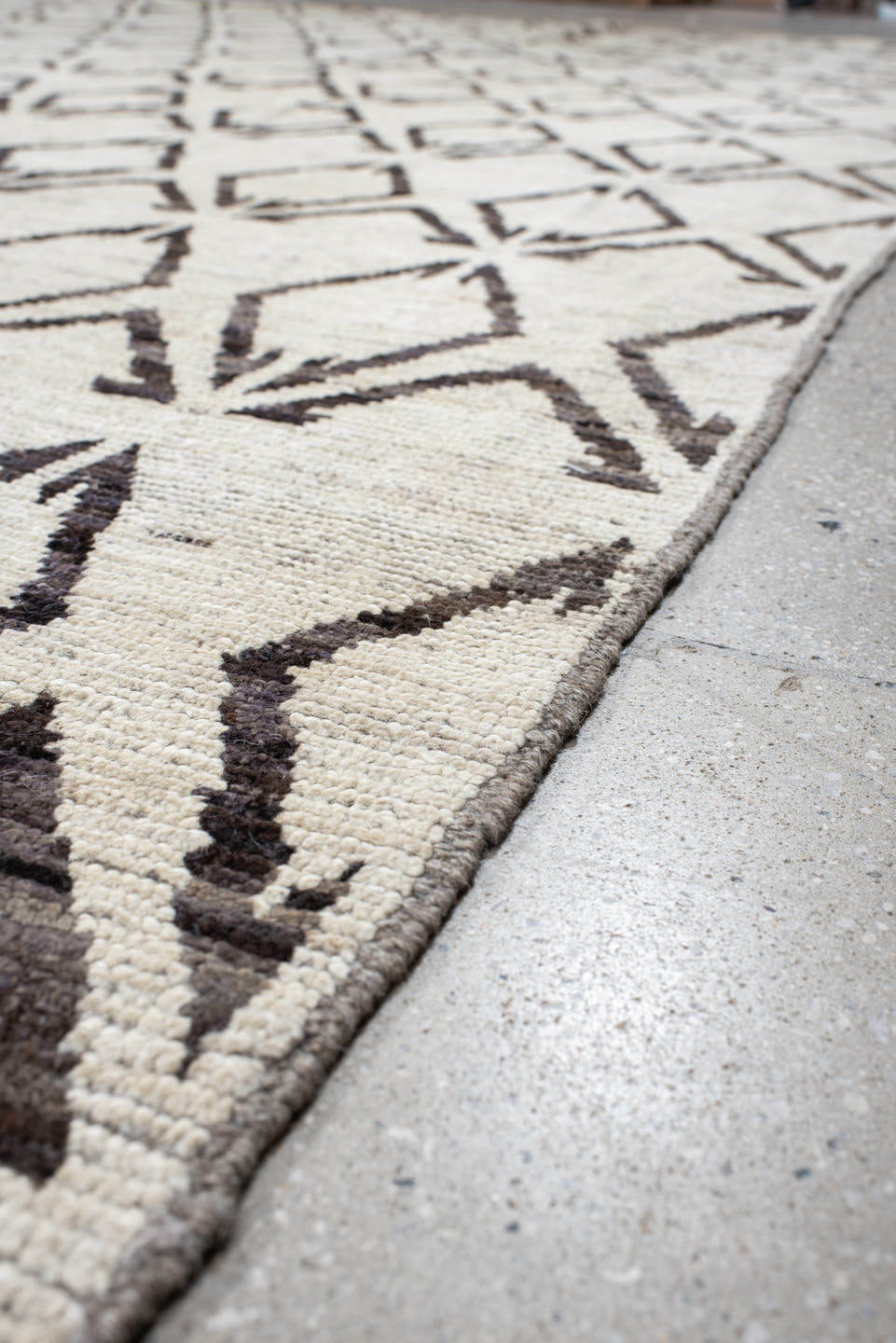 14' x 19' one-of-a-kind handmade vintage Tulu oversize rug. Color palette: ivory, charcoal, taupe, gray, black, beige