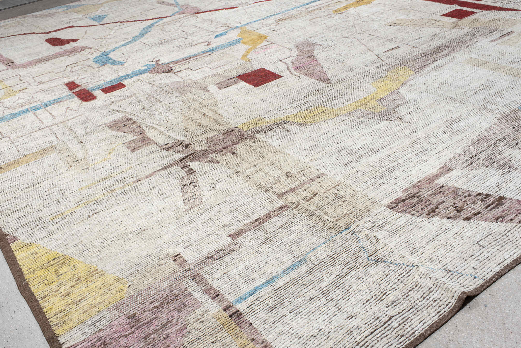 16' x 20' one-of-a-kind handmade vintage Tulu oversize rug. Color palette: ivory, rust, blush, sky blue, soft gold, taupe