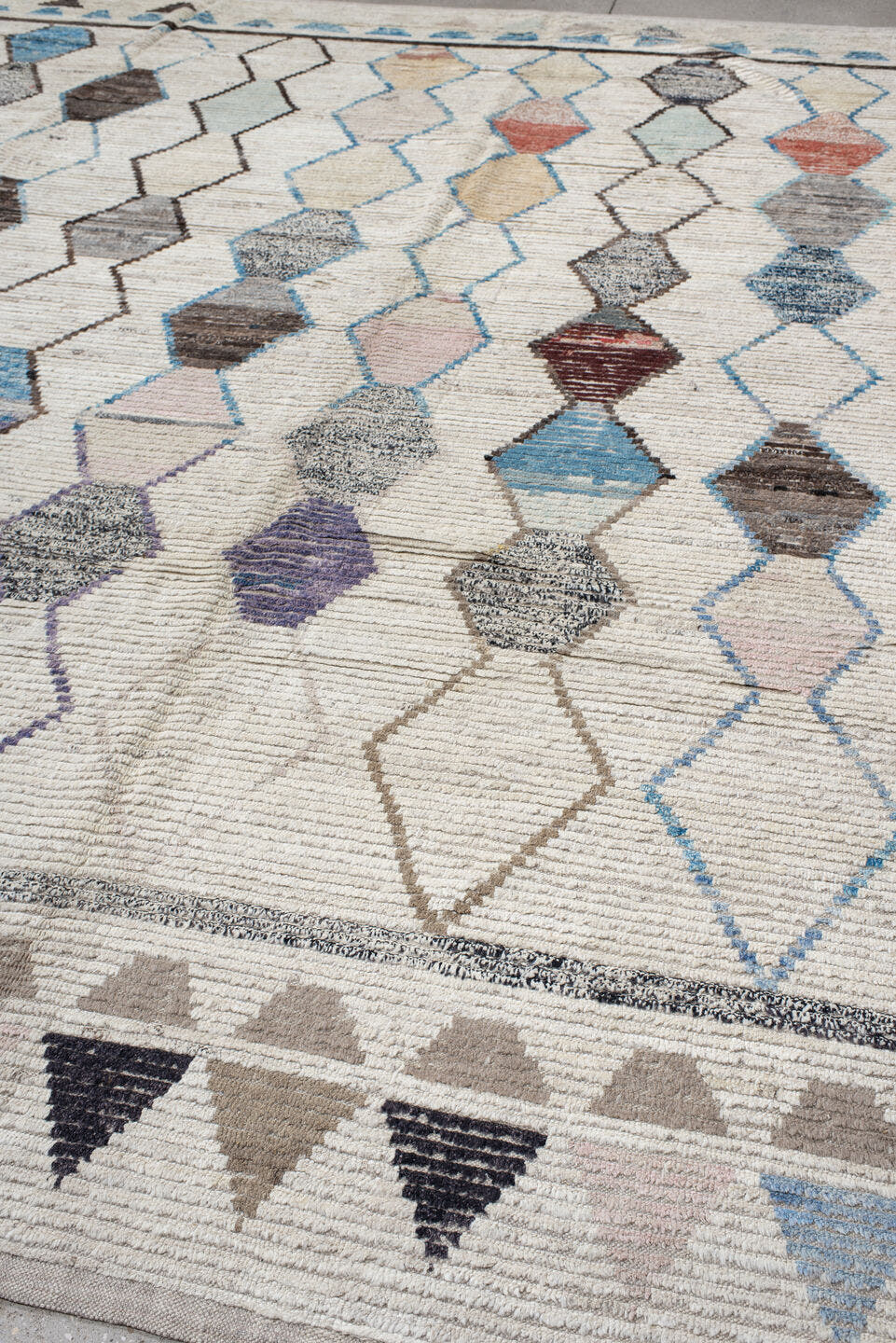11' x 13' one-of-a-kind handmade vintage Tulu oversize rug. Color palette: ivory, sky blue, taupe, gray, charcoal, rose