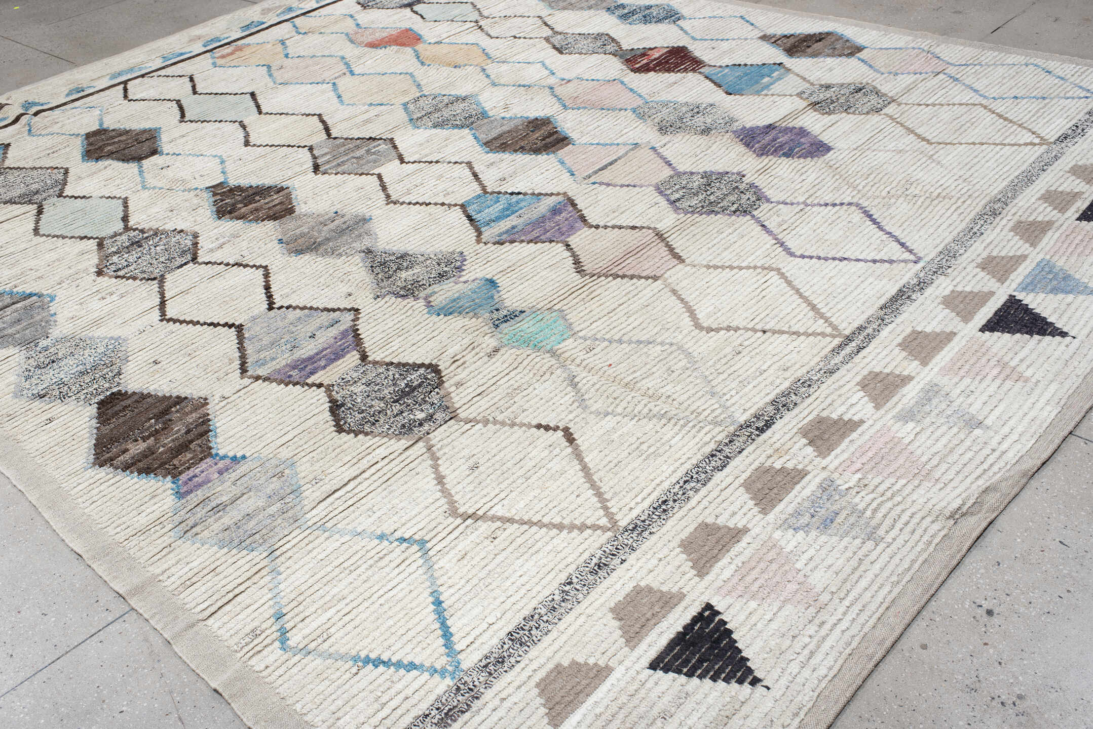 11' x 13' one-of-a-kind handmade vintage Tulu oversize rug. Color palette: ivory, sky blue, taupe, gray, charcoal, rose