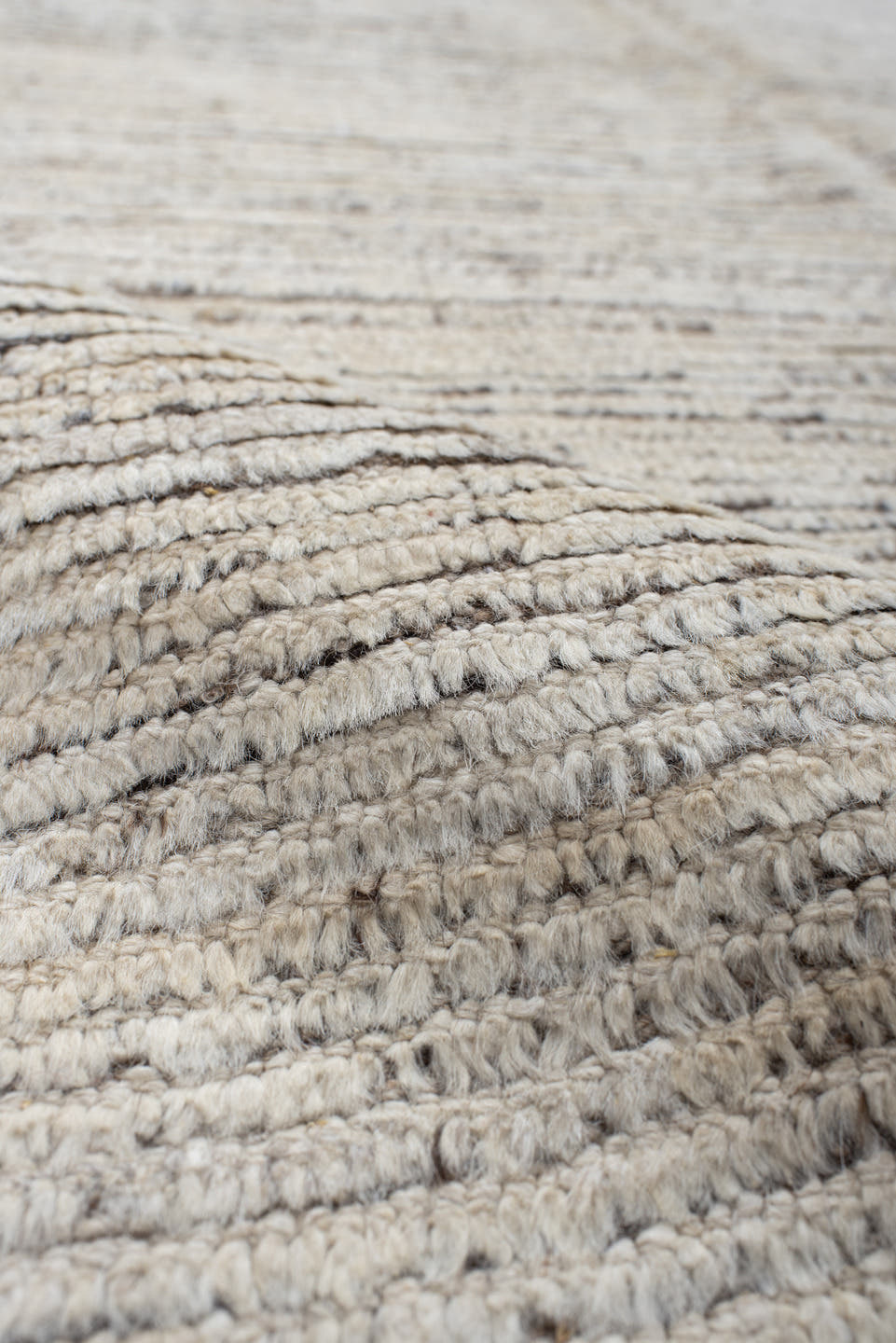 10' x 13' one-of-a-kind handmade vintage Tulu large size rug. Color palette: ivory, charcoal, taupe, brown, gray, black