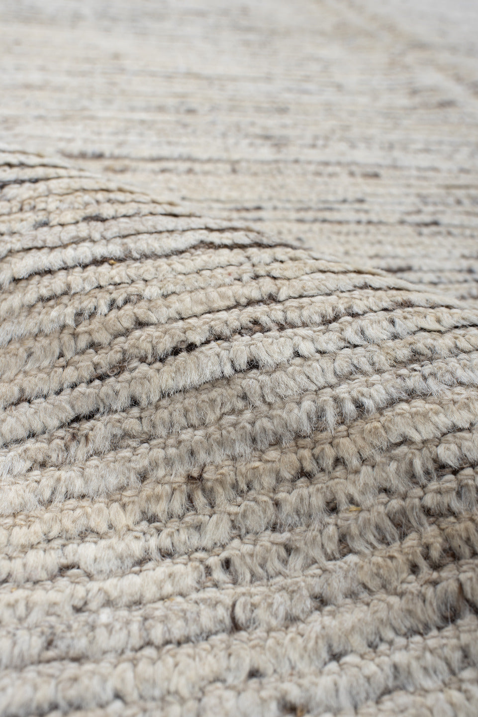 10' x 13' one-of-a-kind handmade vintage Tulu large size rug. Color palette: ivory, charcoal, taupe, brown, gray, black