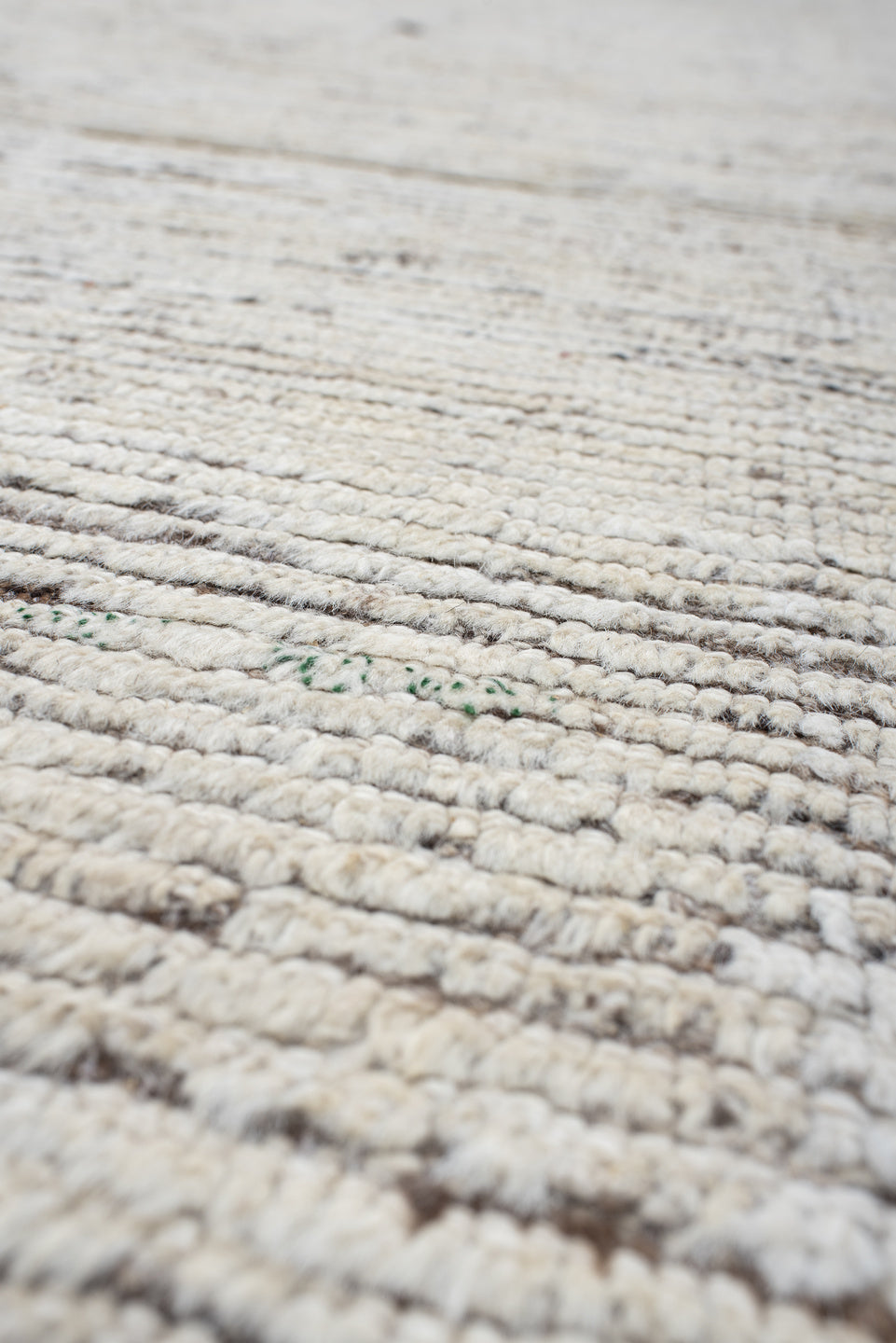 10' x 13' one-of-a-kind handmade vintage Tulu large size rug. Color palette: ivory, charcoal, taupe, brown, gray, black
