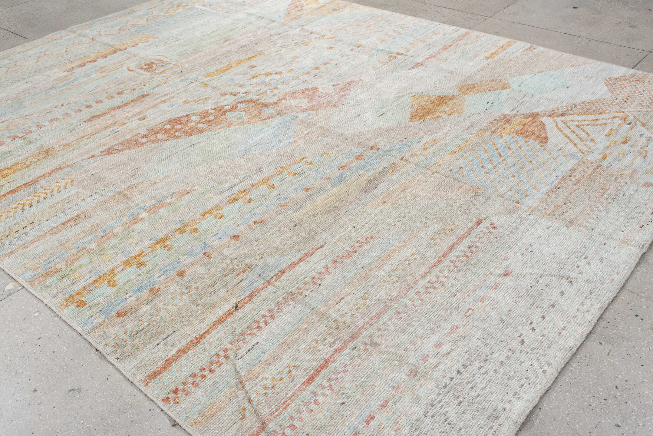 9' x 11' one-of-a-kind handmade vintage Tulu large size rug. Color palette: ivory, taupe, pale aqua, terracotta, sage, sand