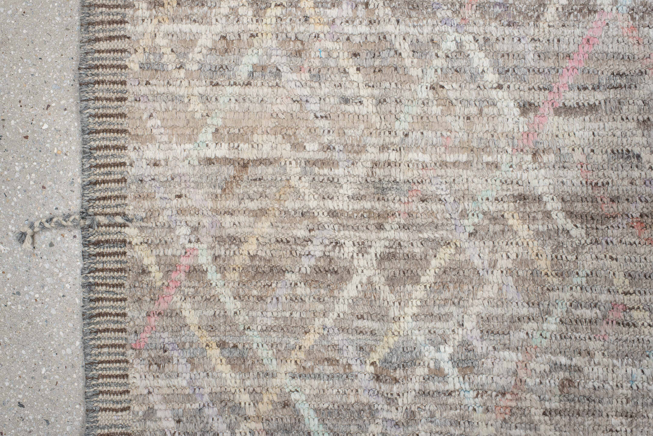 8' x 9' one-of-a-kind handmade vintage Tulu rug. Color palette: ivory, taupe, gray, blush, pale blue, charcoal, cream, coral