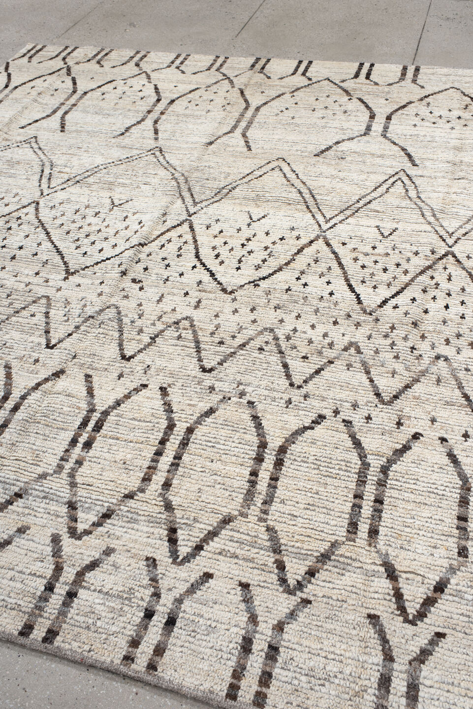 8' x 9' one-of-a-kind handmade vintage Tulu rug. Color palette: ivory, brown, taupe, charcoal, cream, beige, gray, black