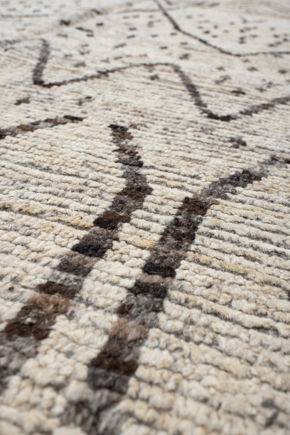 8' x 9' one-of-a-kind handmade vintage Tulu rug. Color palette: ivory, brown, taupe, charcoal, cream, beige, gray, black