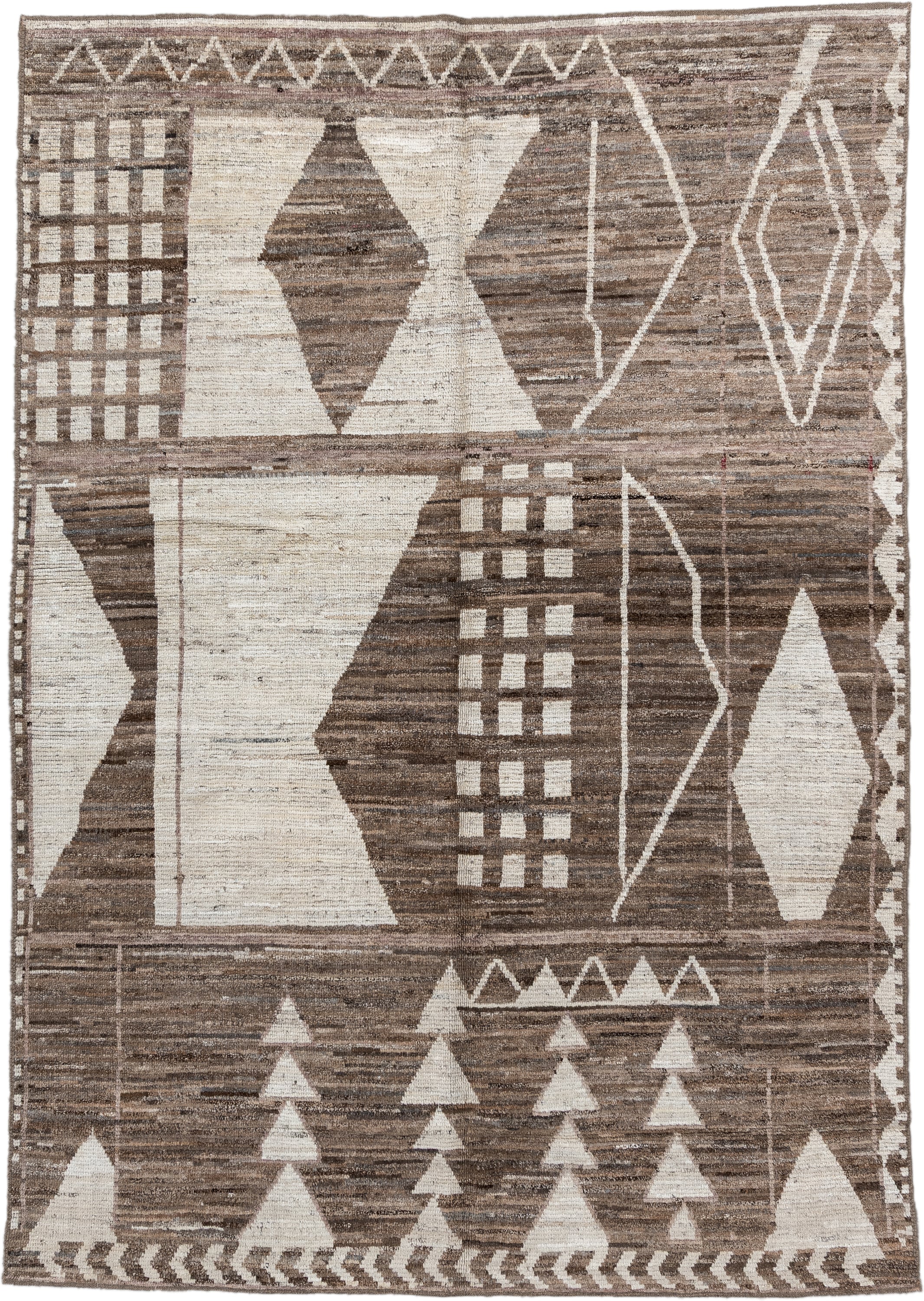 7' x 9' one-of-a-kind handmade vintage Tulu rug. Color palette: ivory, taupe, brown, charcoal, cream, rose, slate, pale blue