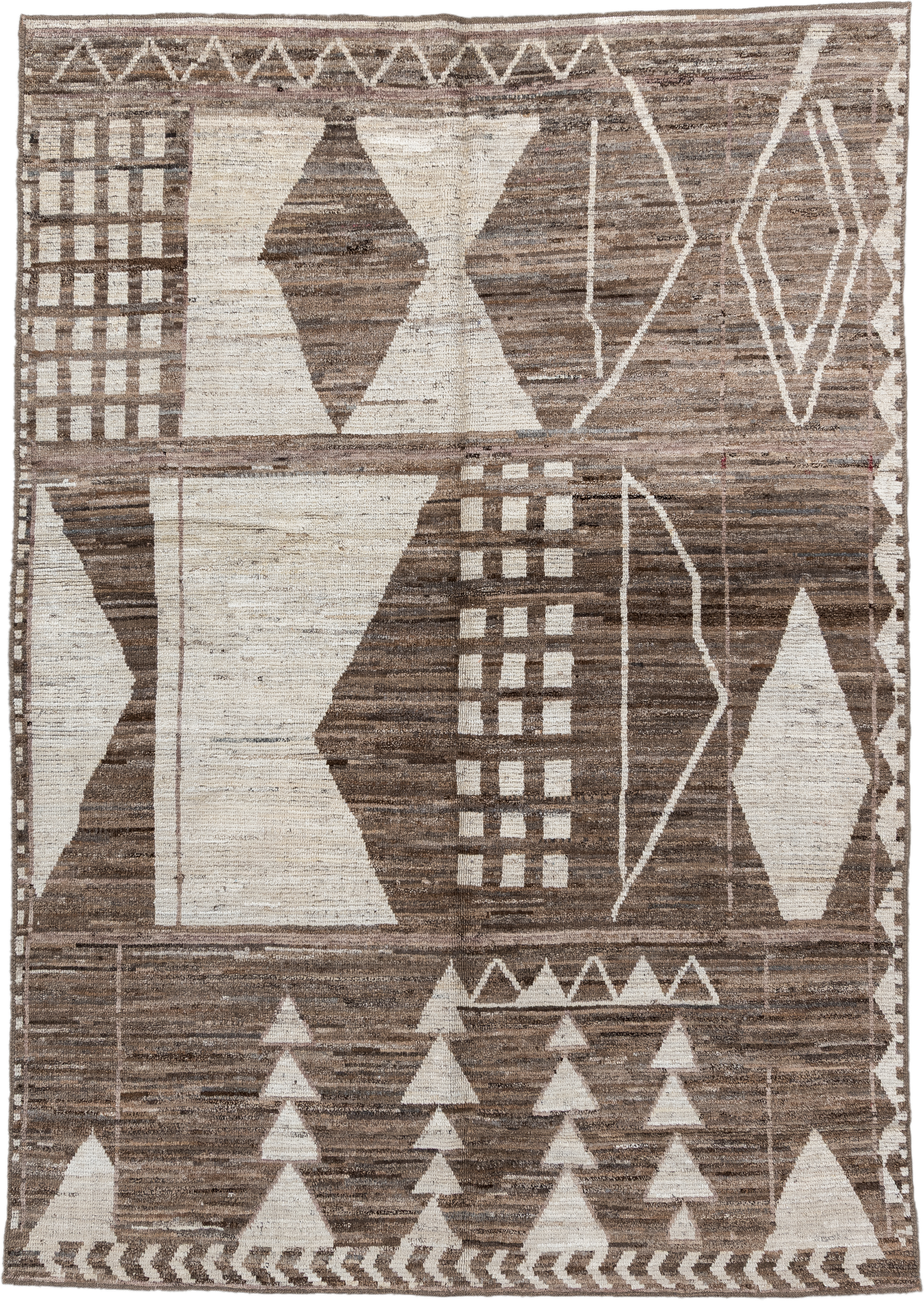 7' x 9' one-of-a-kind handmade vintage Tulu rug. Color palette: ivory, taupe, brown, charcoal, cream, rose, slate, pale blue