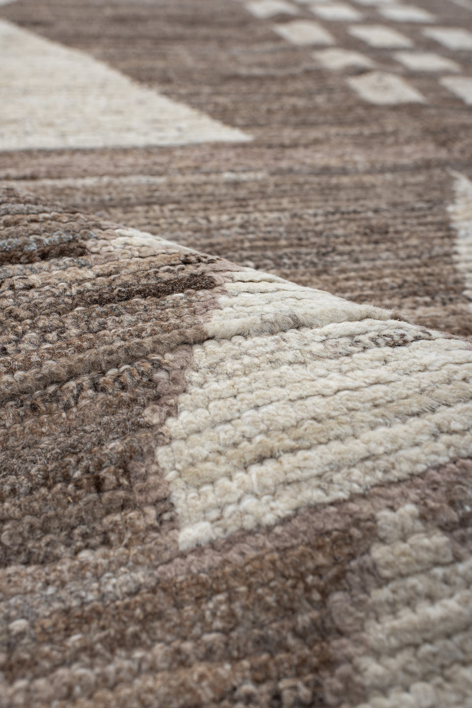 7' x 9' one-of-a-kind handmade vintage Tulu rug. Color palette: ivory, taupe, brown, charcoal, cream, rose, slate, pale blue