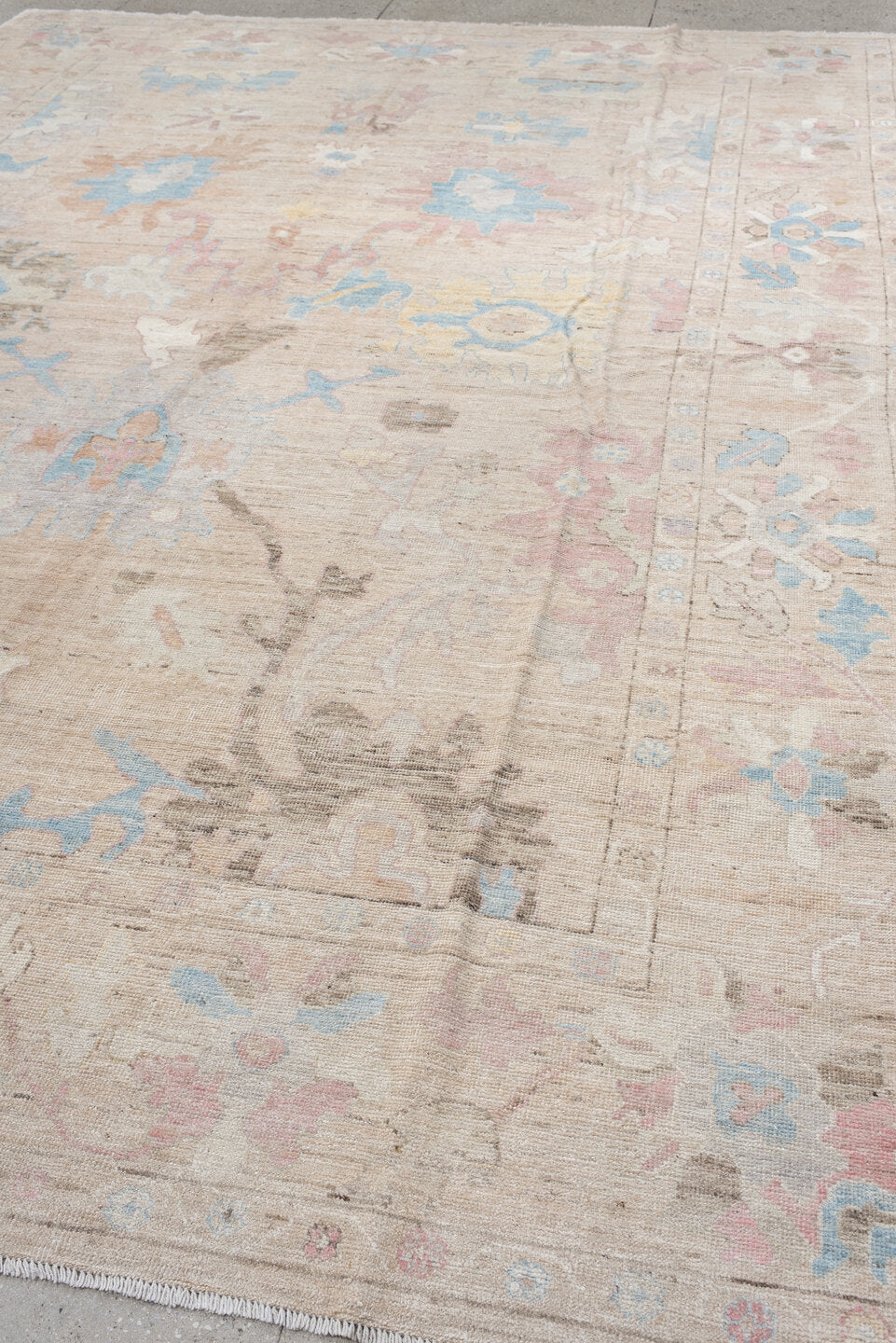 9' x 13' one-of-a-kind handmade vintage Oushak large size rug. Color palette: beige, ivory, sky blue, blush, taupe