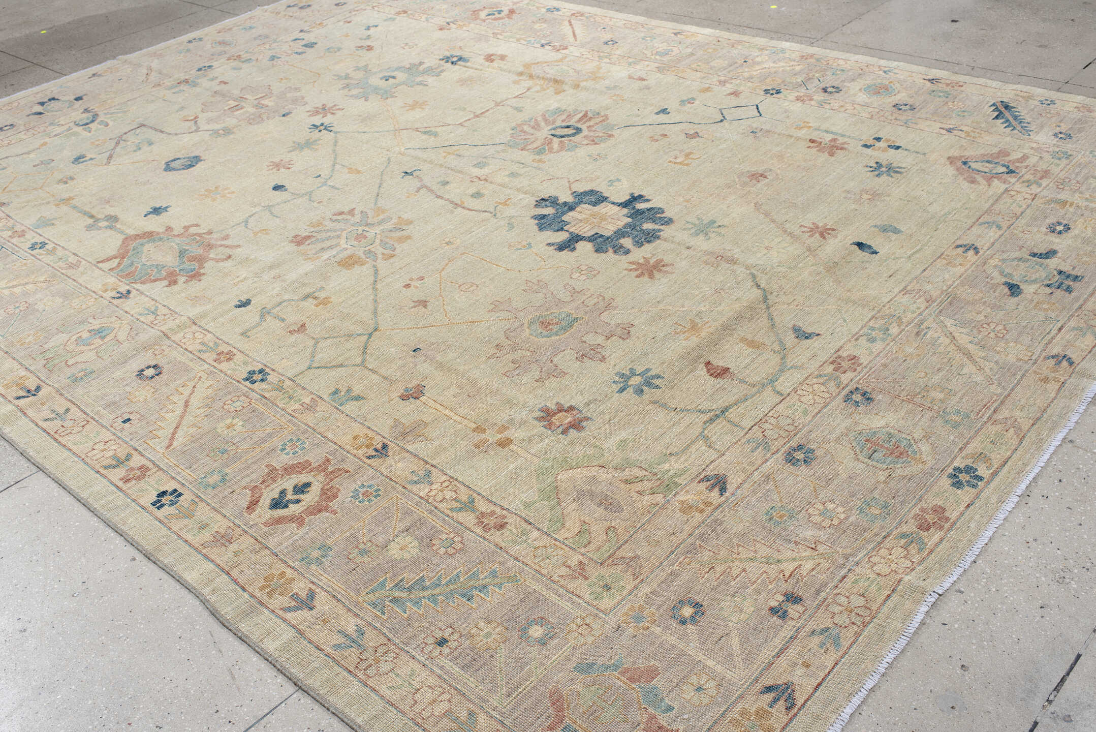10' x 13' one-of-a-kind handmade vintage Oushak large size rug. Color palette: ivory, beige, pale blue, blush, sage, sand
