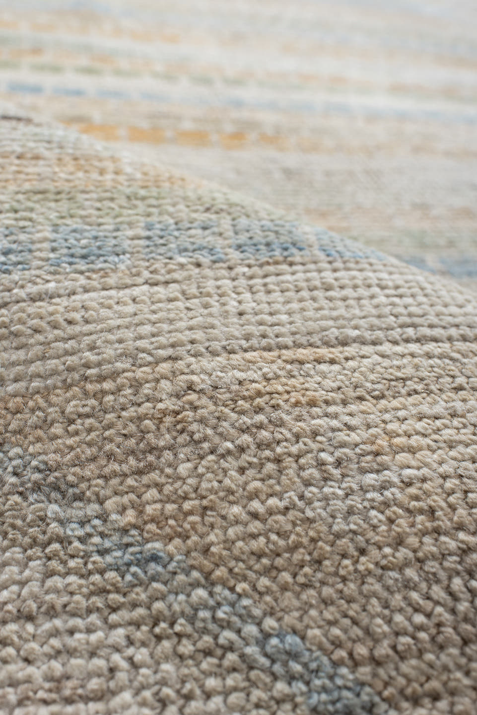 9' x 13' one-of-a-kind handmade vintage Tulu large size rug. Color palette: ivory, pale blue, sand, sage, peach, taupe