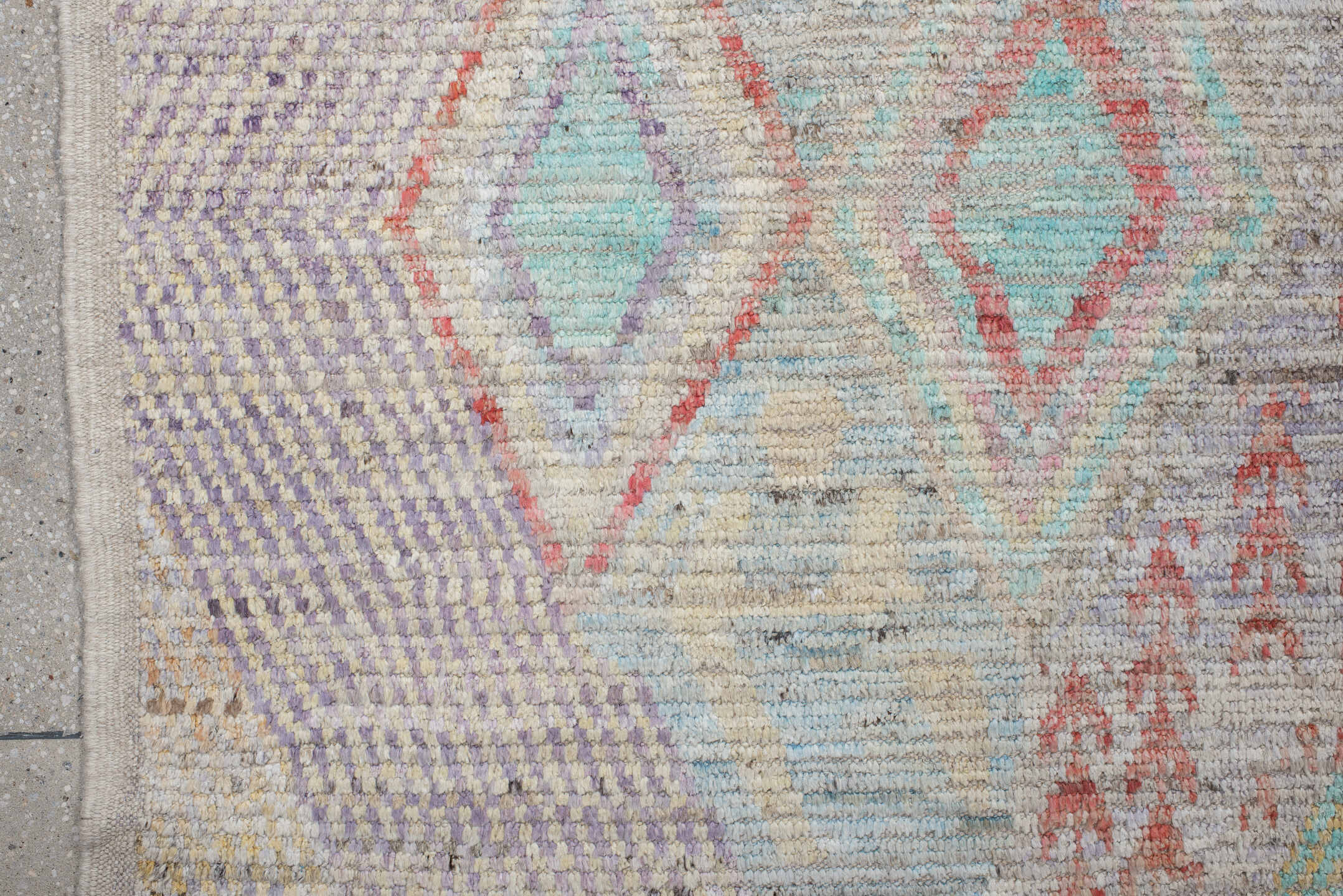 9' x 13' one-of-a-kind handmade vintage Tulu large size rug. Color palette: ivory, lavender, aqua, blush, saffron, coral